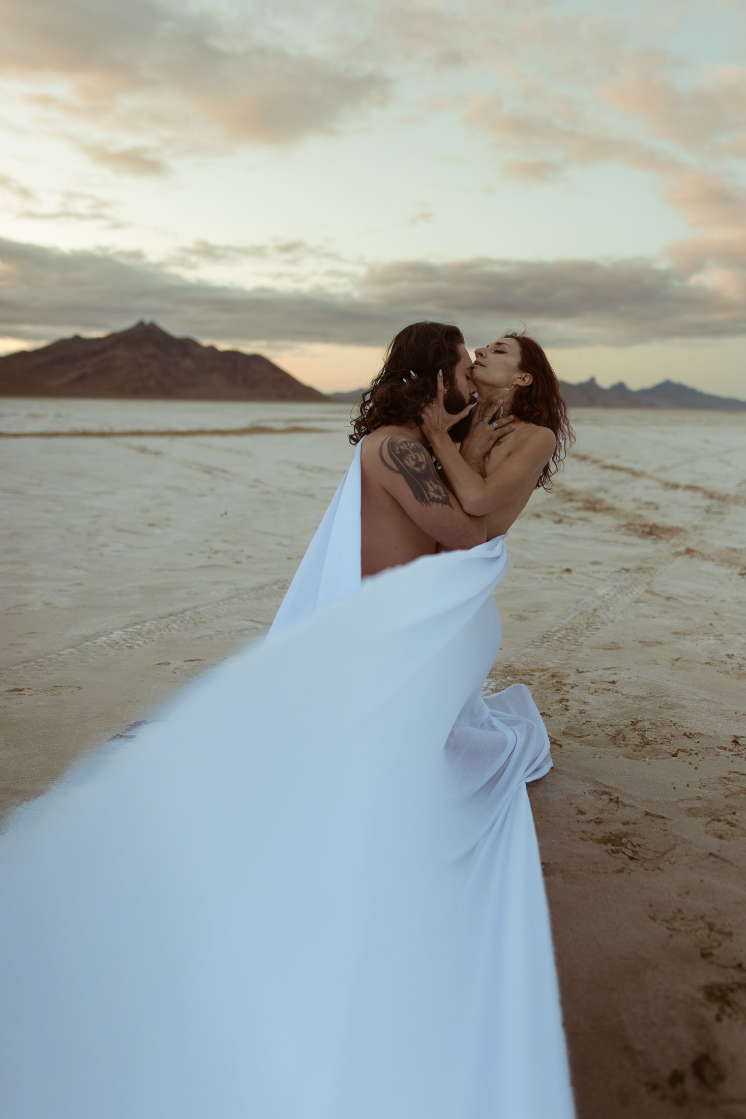 Cinematic art elopement at the Bonneville Salt Flats in Salt Lake City, UT. Artistic Direction and photography by Sammy Aucella Photography.