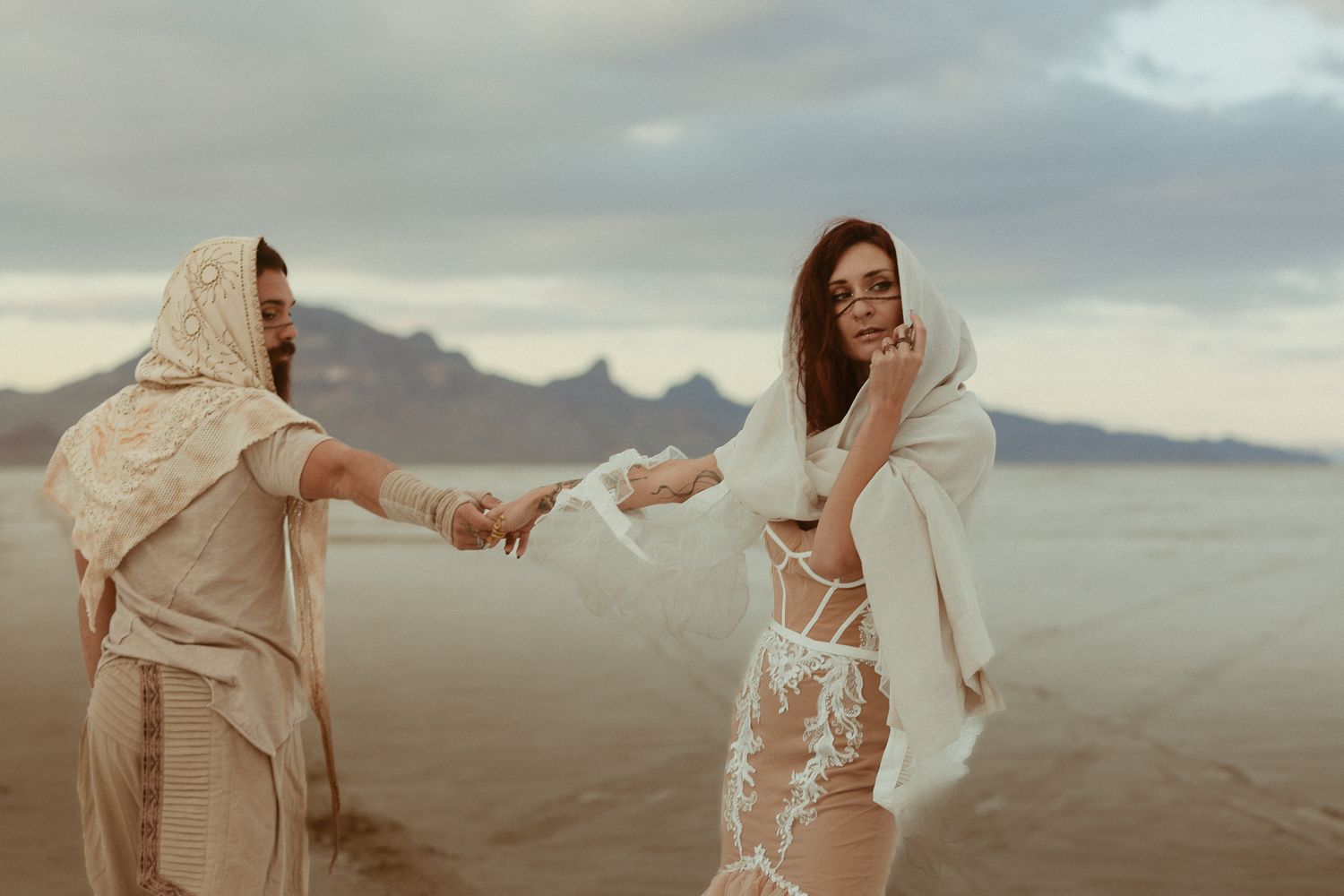 Cinematic art elopement at the Bonneville Salt Flats in Salt Lake City, UT. Artistic Direction and photography by Sammy Aucella Photography.