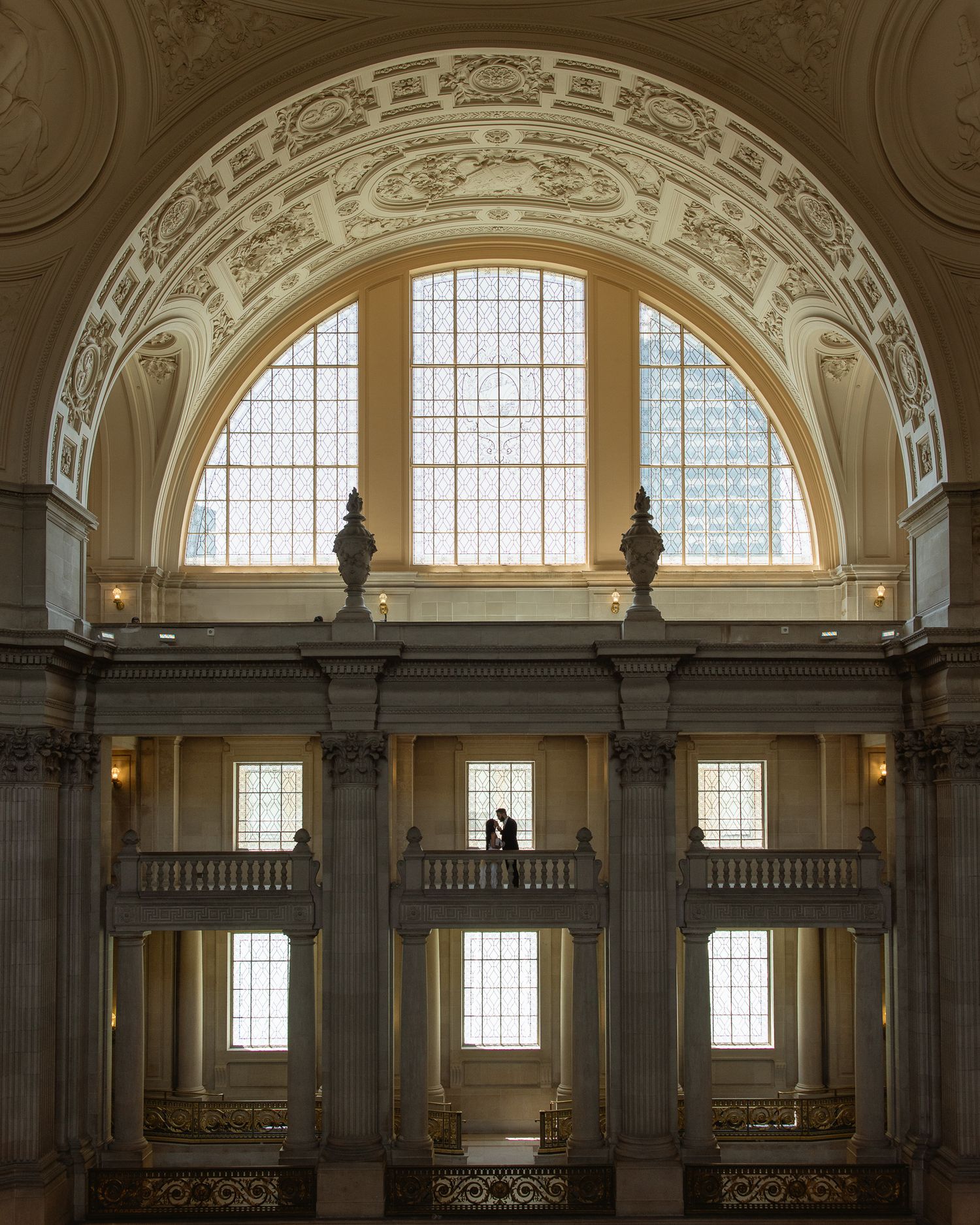 Grand arched windows of San Francisco City Hall at an elegant elopement, by Sammy Aucella Photography
