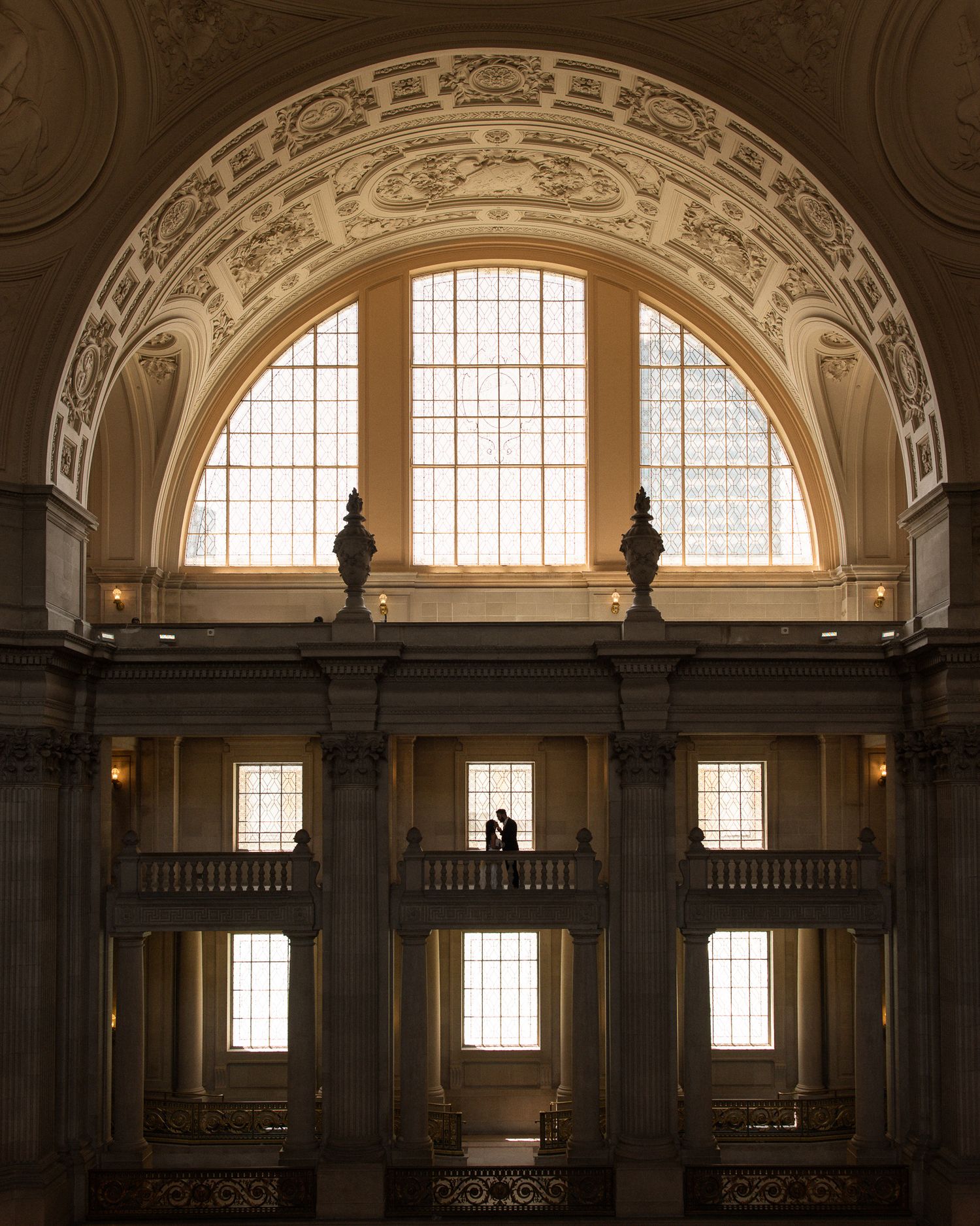 Cinematic photography of wedding couple at San Francisco City Hall in San Francisco, California, by Sammy Aucella Photography