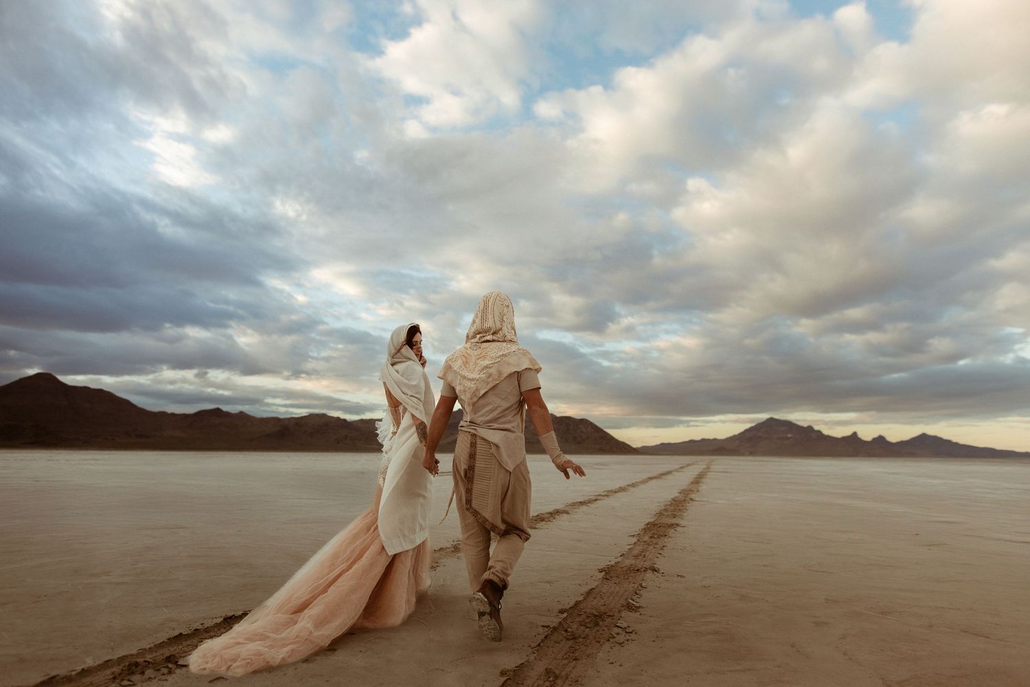Cinematic art elopement at the Bonneville Salt Flats in Salt Lake City, UT. Artistic Direction and photography by Sammy Aucella Photography.