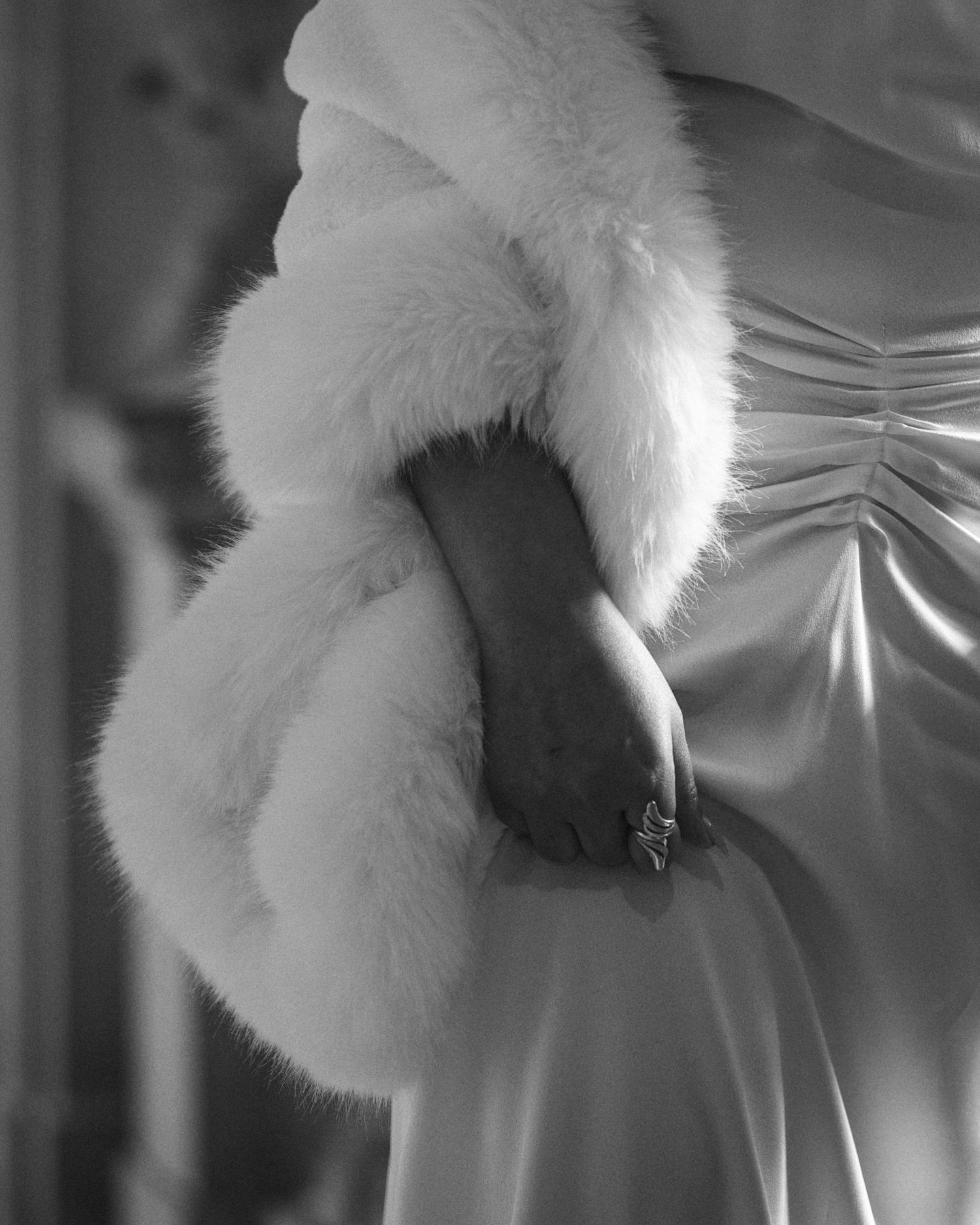 Black and white fur stole and gown detail at a San Francisco City Hall elopement, by Sammy Aucella Photography