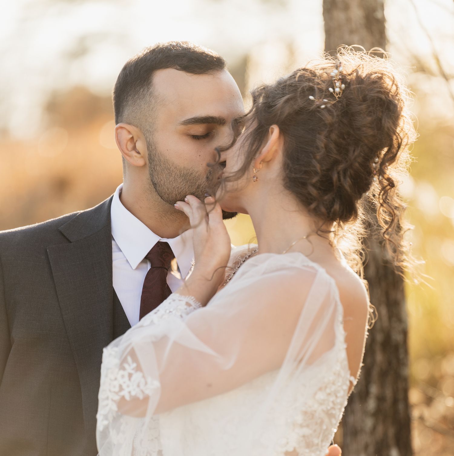 Romantic golden hour wedding portraits captured in beautiful natural lighting.