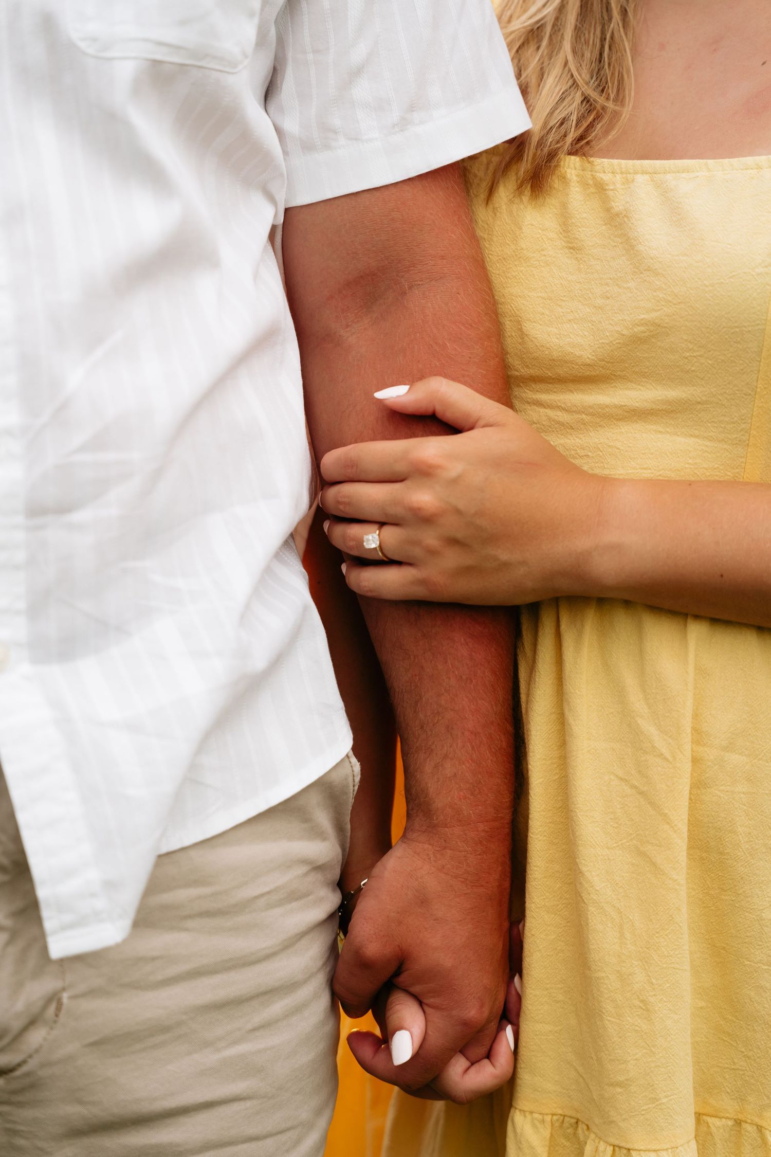A series of cropped photos showing two people embracing, one wearing white and one in yellow.