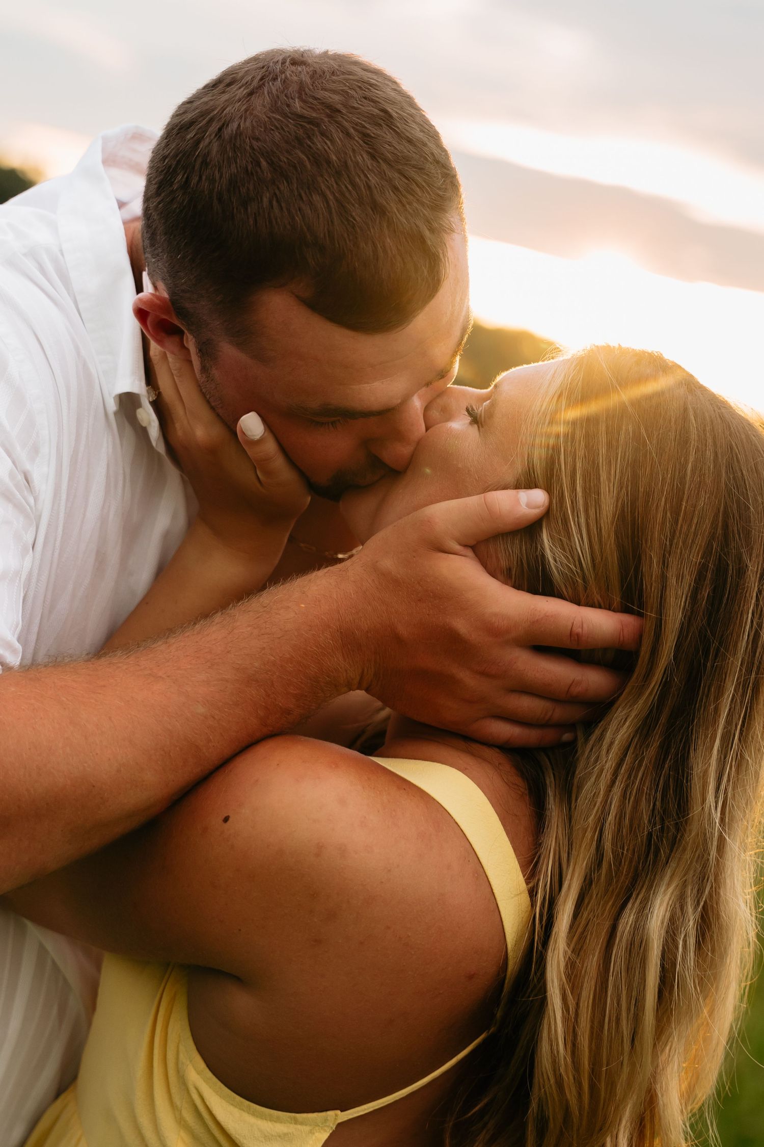 A couple sharing an intimate moment in a series of close-up shots against a warm sunlit background.