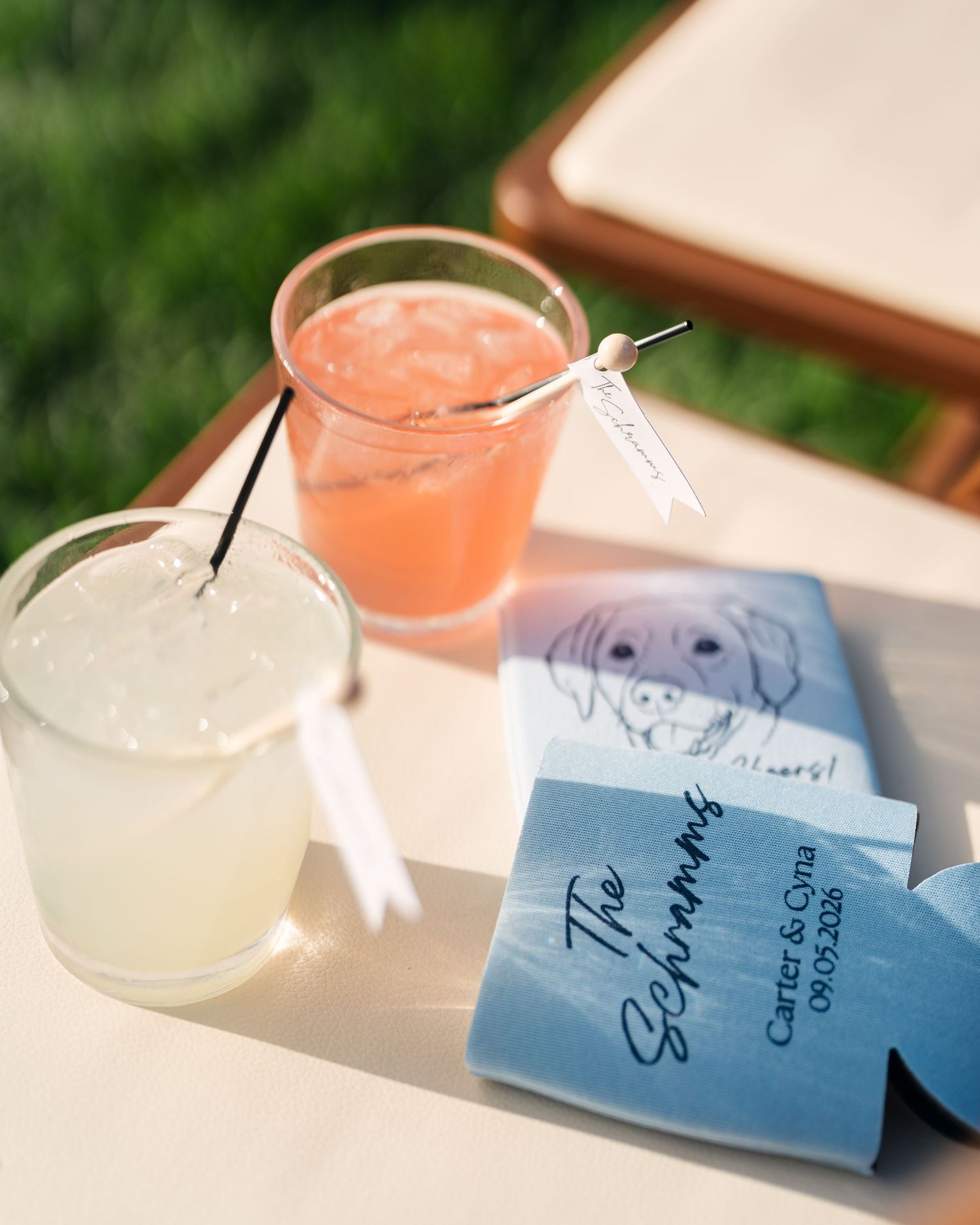 Wedding cocktails with custom koozie favors reading The Schramms, Carter & Cyra, 03.07.2026.