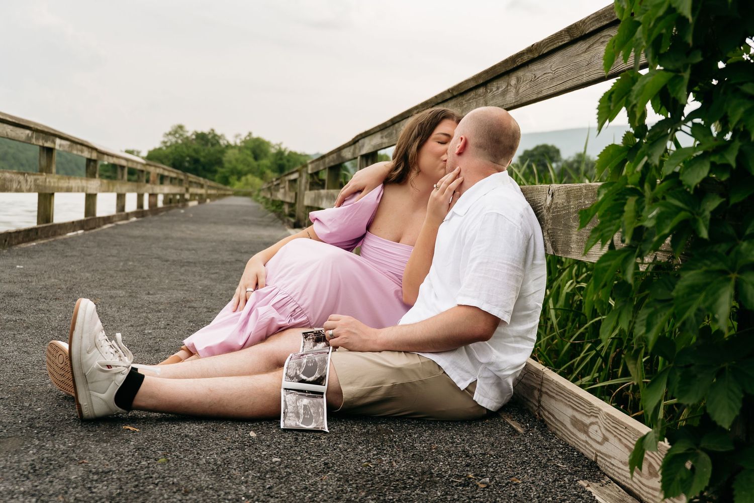 A series of romantic lifestyle photos showing a couple lying on a wooden deck in a garden setting.