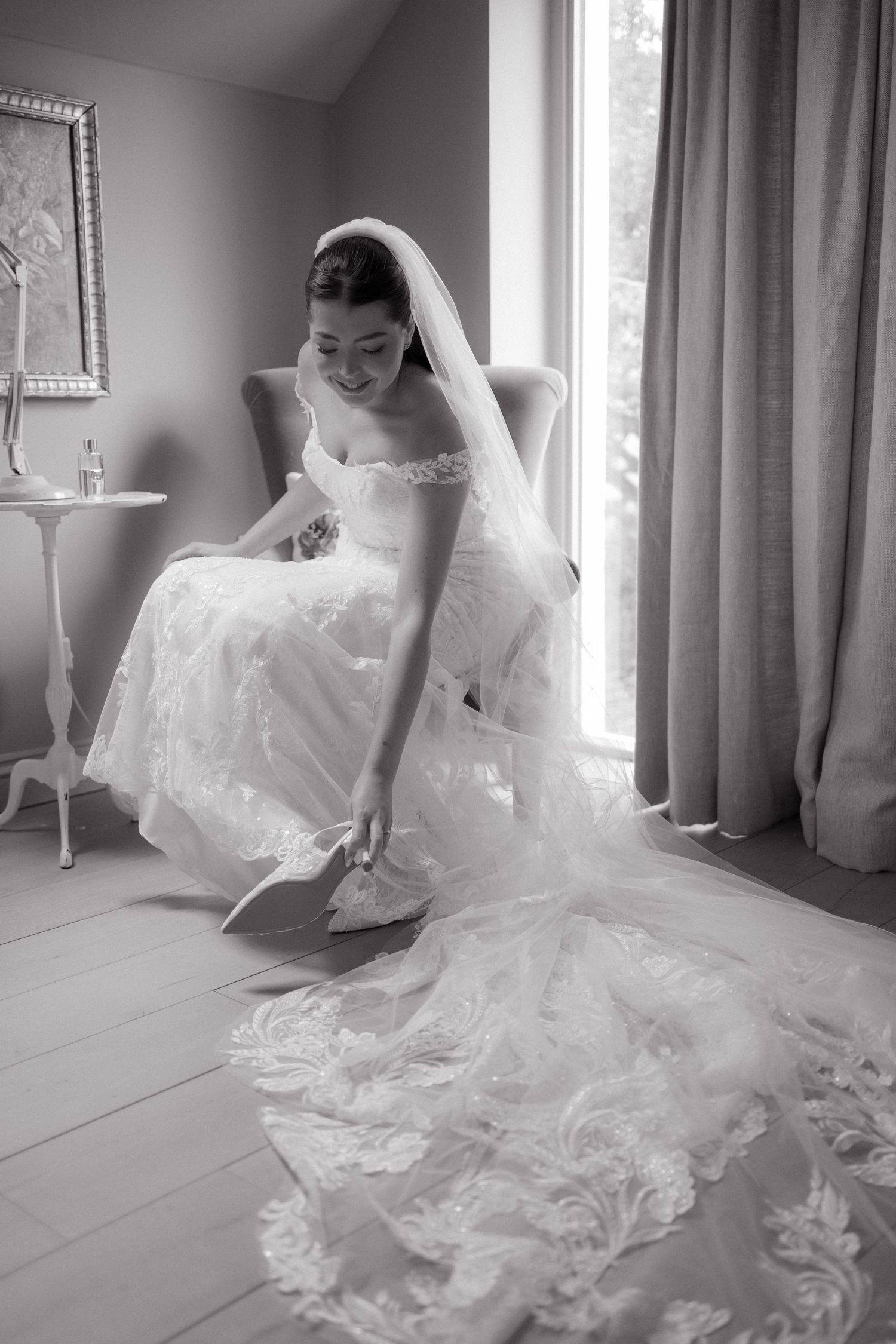Black and white photos showing the elegant movement and flow of a wedding dress train.