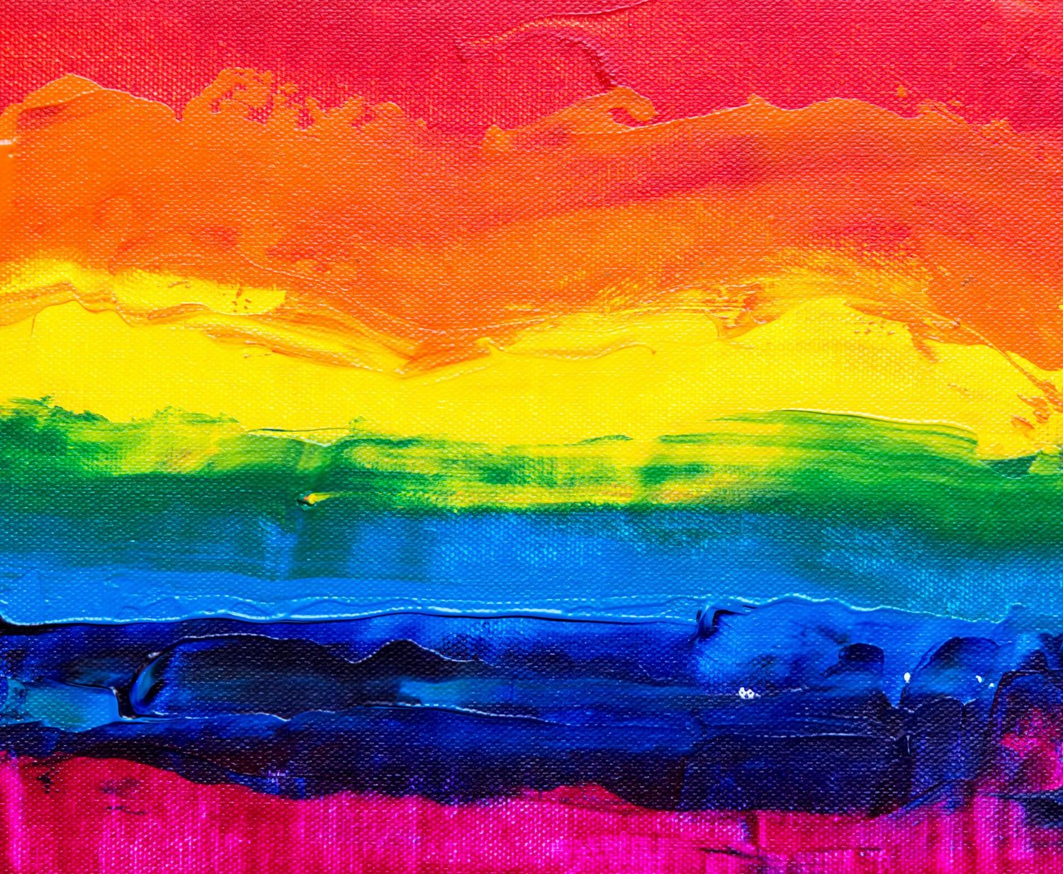Abstract rainbow watercolor painting with vibrant horizontal stripes of red, orange, yellow, green, blue and purple.