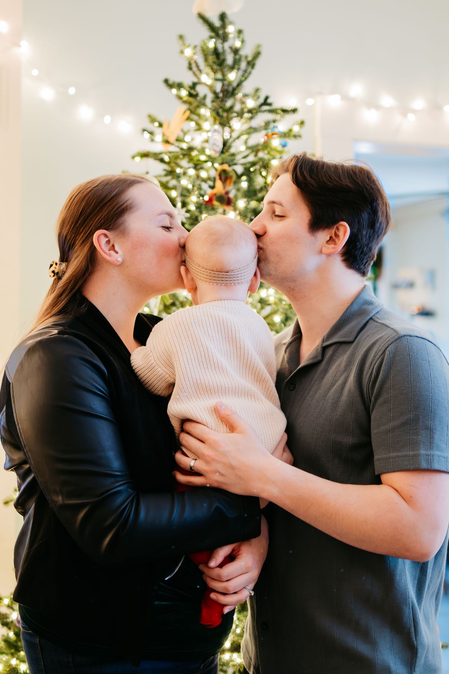 A series of four intimate photos showing a couple sharing tender kisses and embraces in a bright indoor setting.