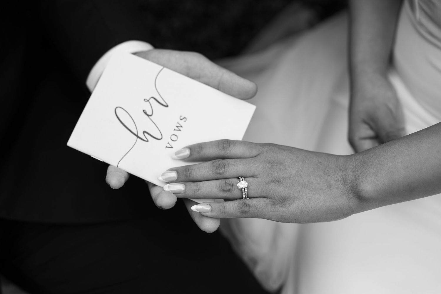 Close-up sequence of hands exchanging small paper notes at a wedding celebration.