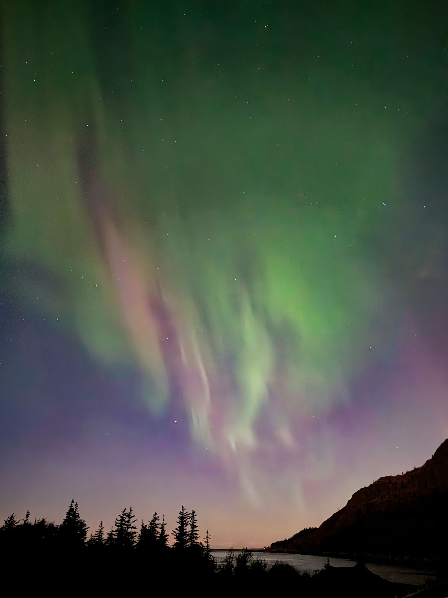 This is an image of the Northern Lights (Aurora Borealis) as seen near Anchorage, Alaska.