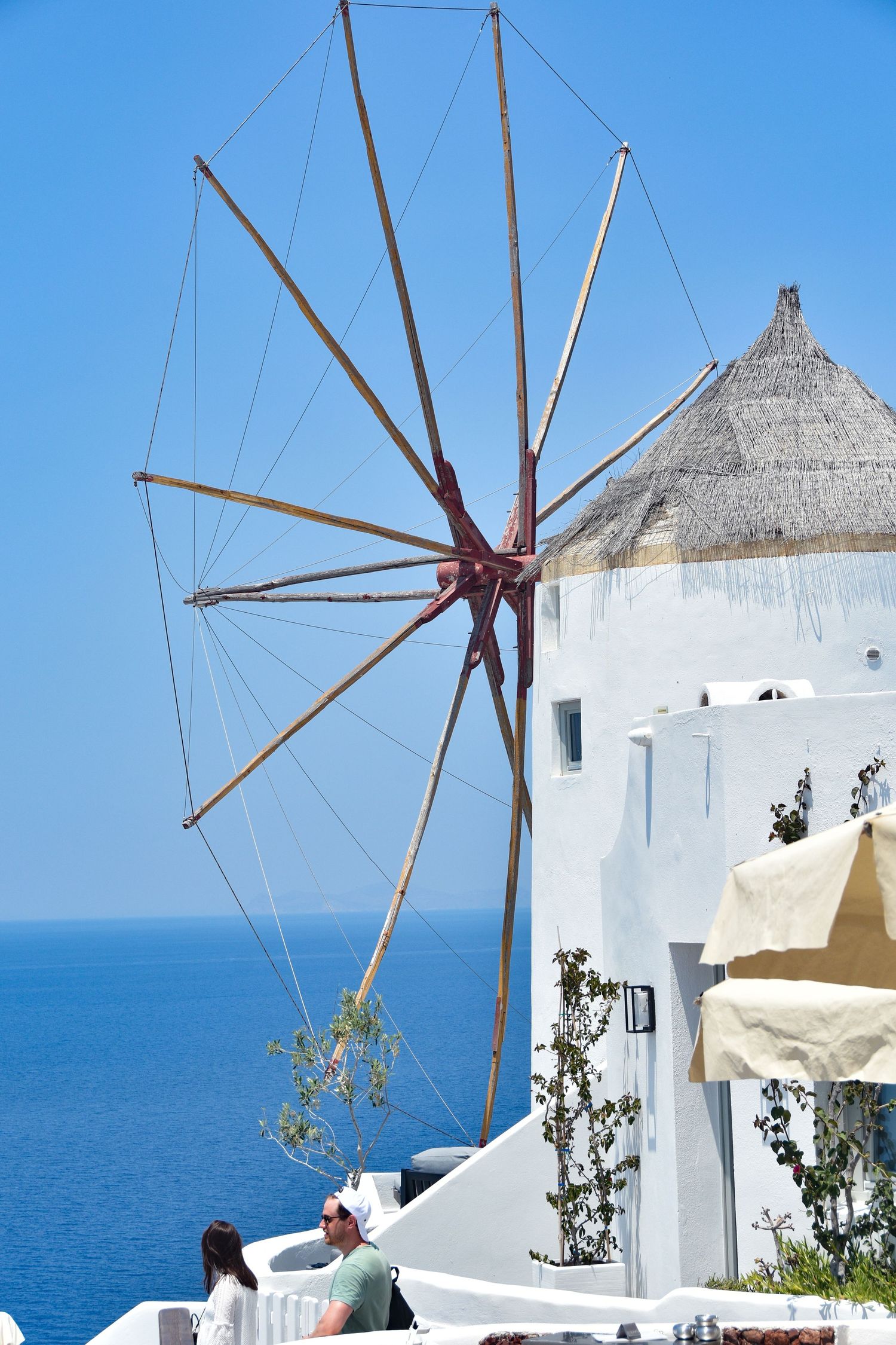 Santorini Island in Greece has beautiful windmills that are iconic landmarks of the region.