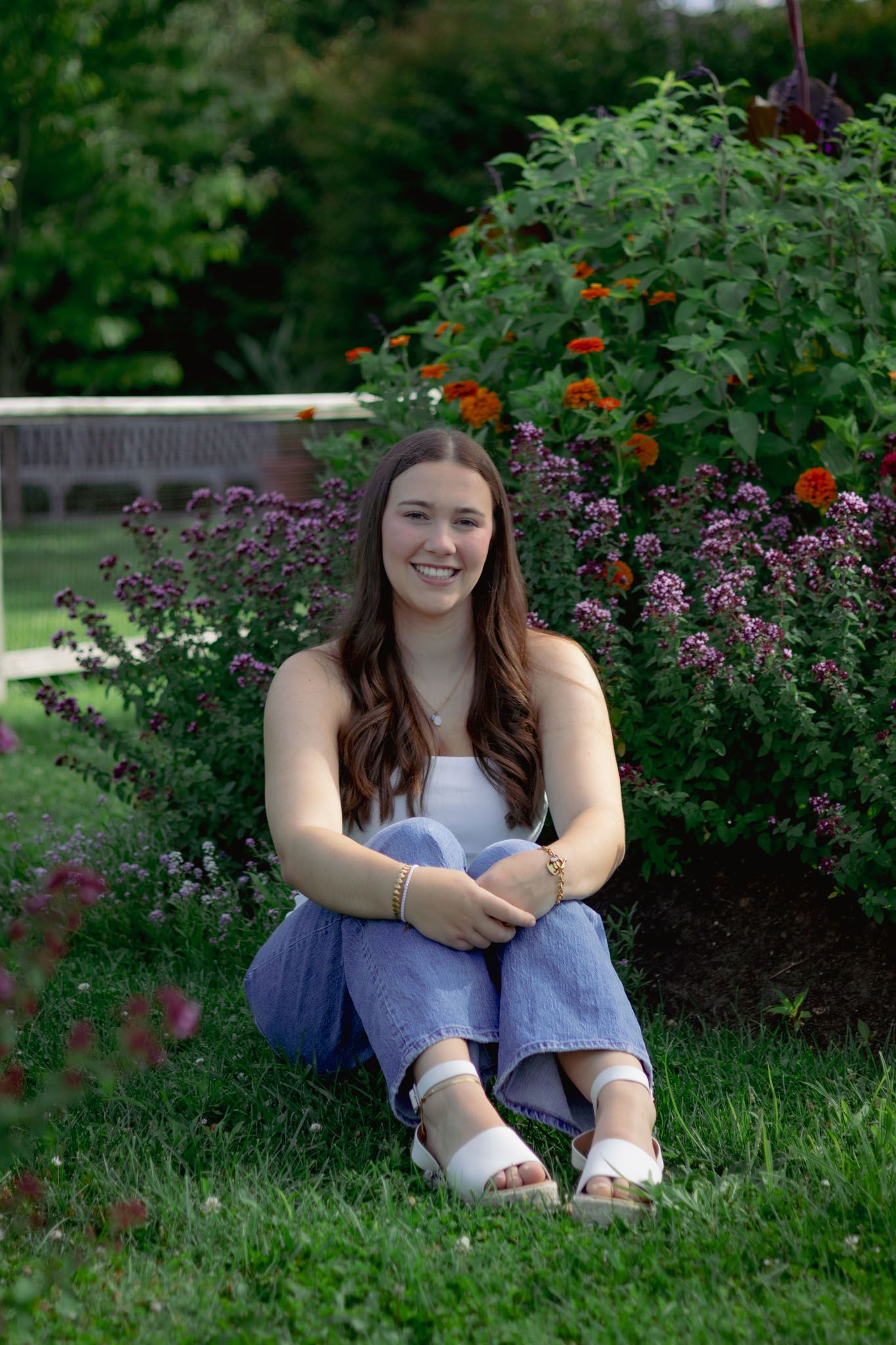 High school senior smiling during outdoor portrait session in Andover, MA