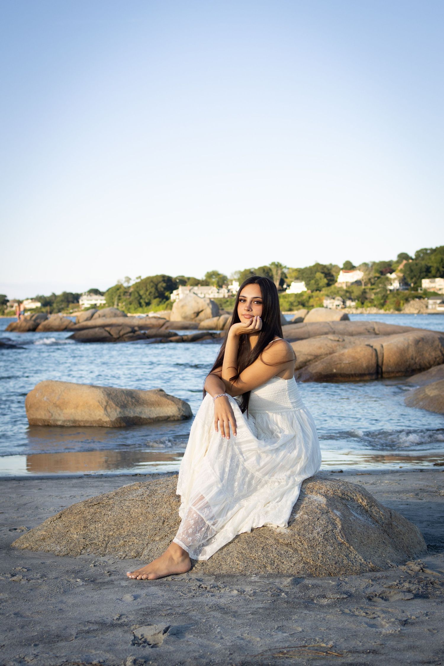 Senior posing at the beach in Gloucester.