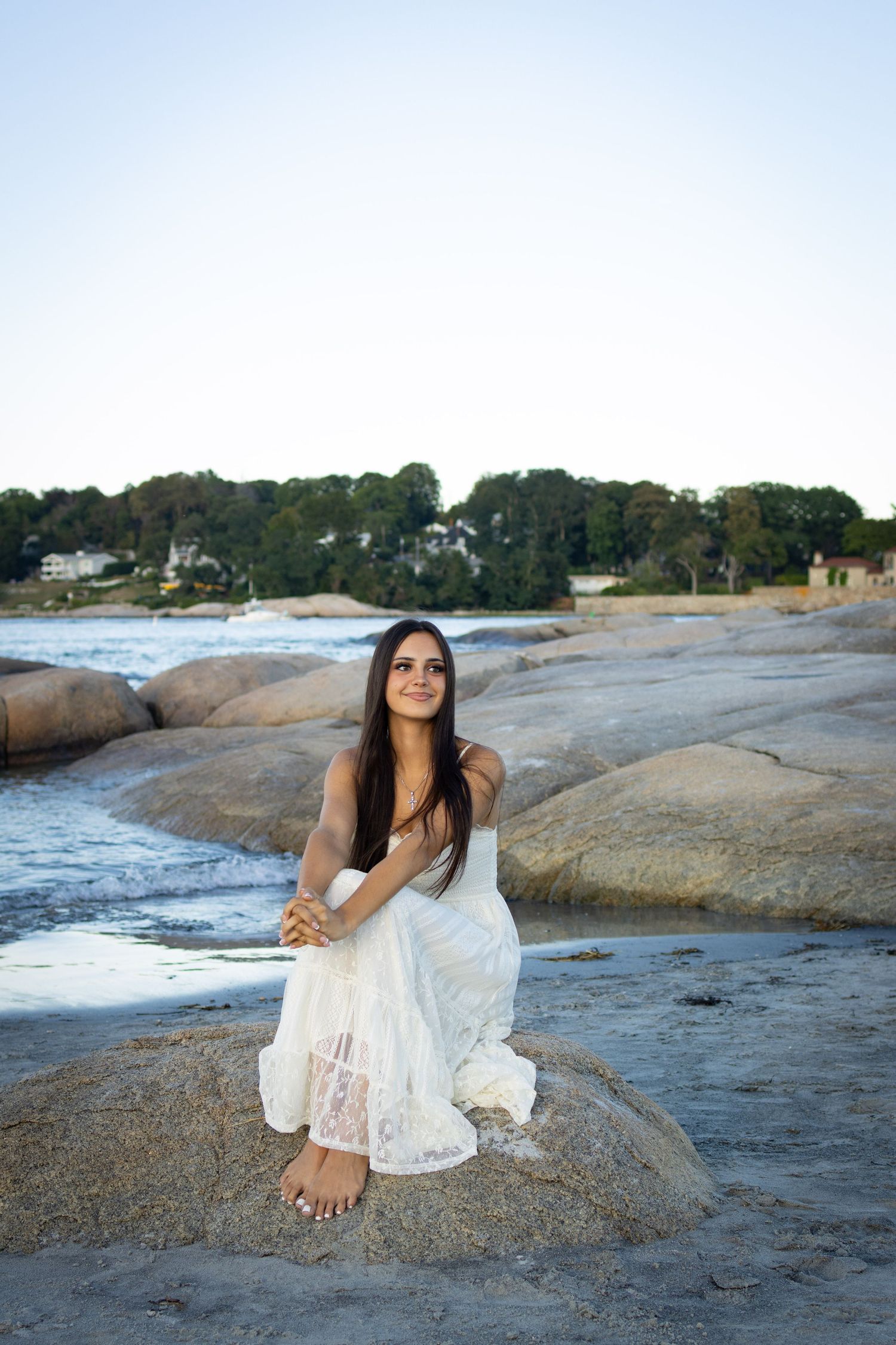 Senior posing at the beach in Gloucester.