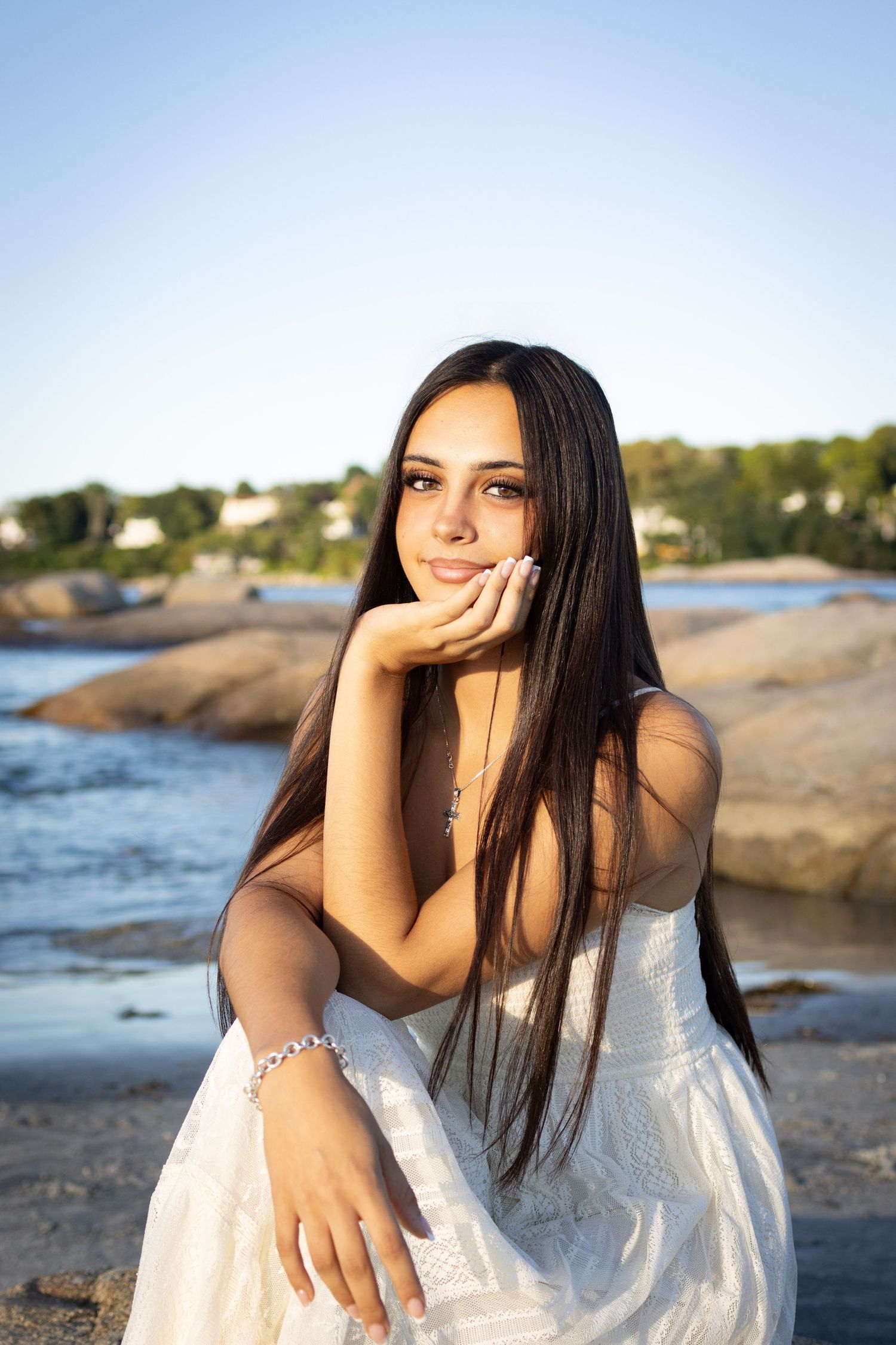 Senior posing at the beach in Gloucester.