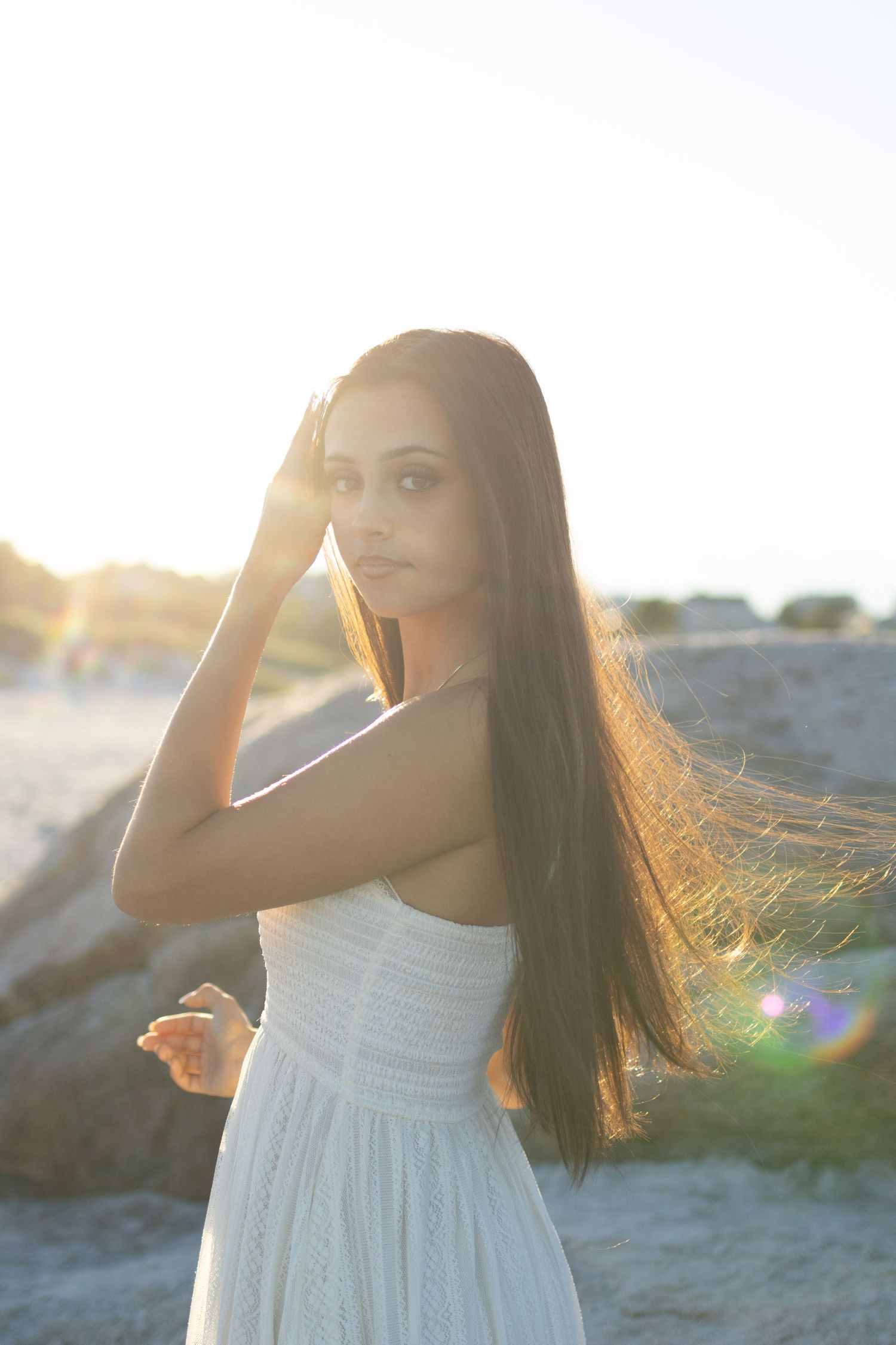 Senior posing at the beach in Gloucester.