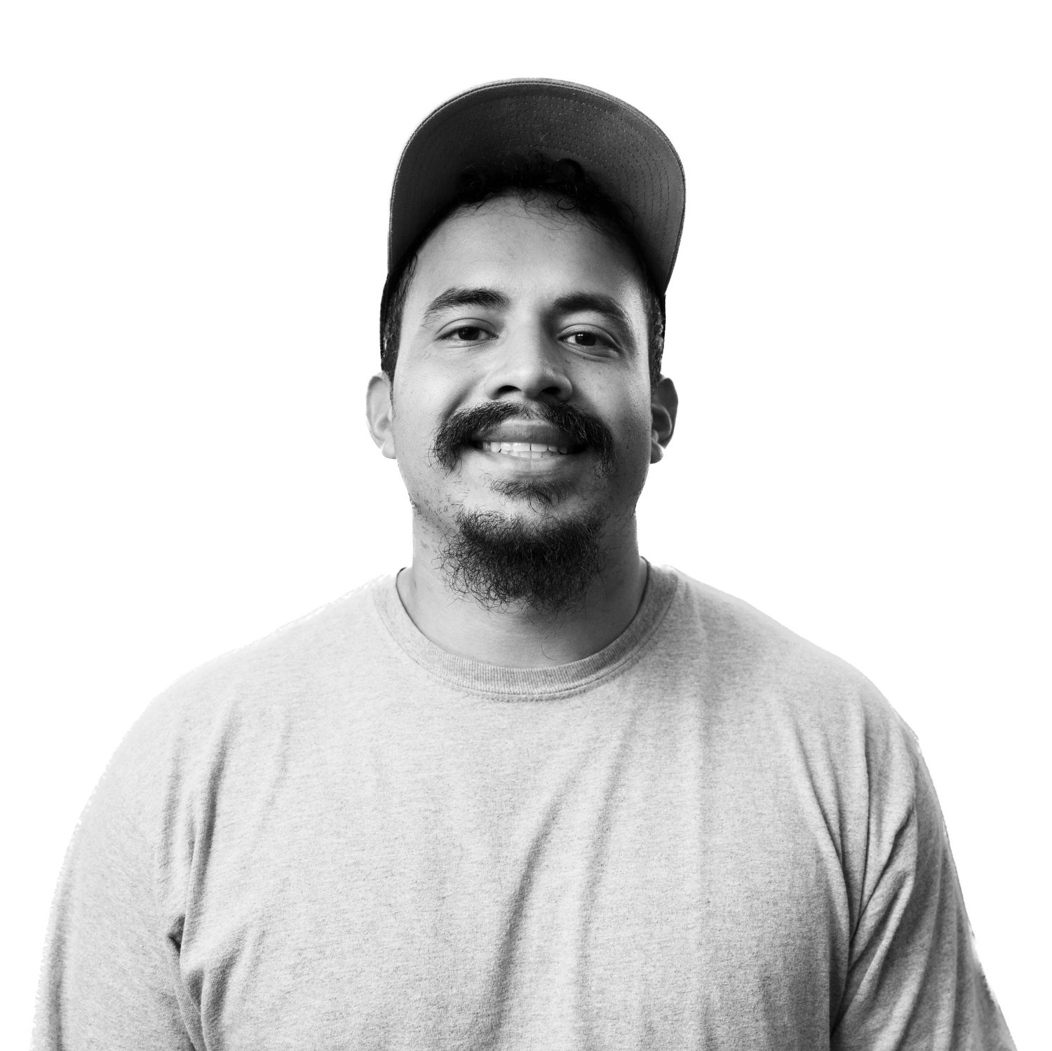 A black and white portrait series showing different expressions.