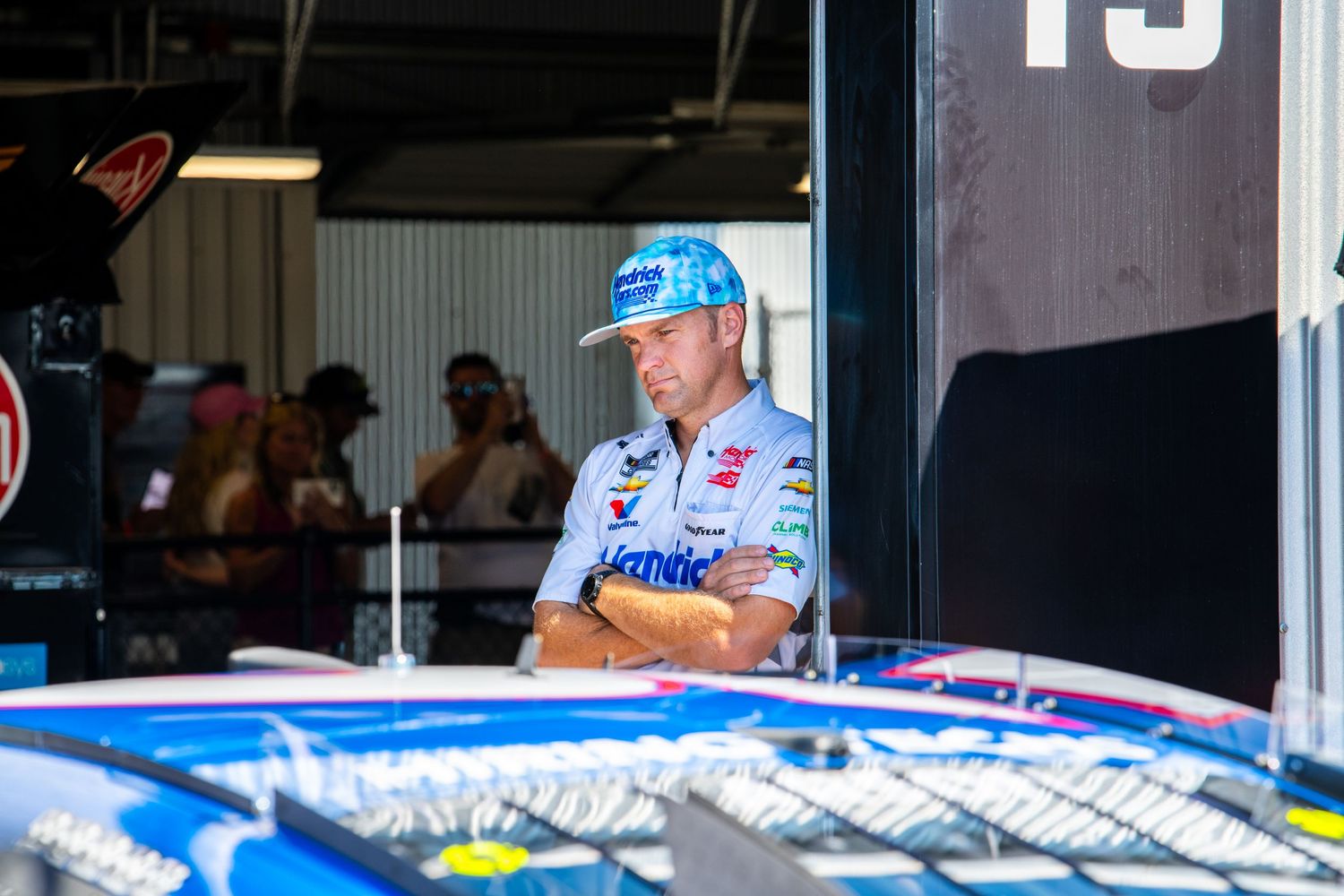 Kyle Larson Hendrick motorsports crew chief at talladega super speedway in the pits with nascar