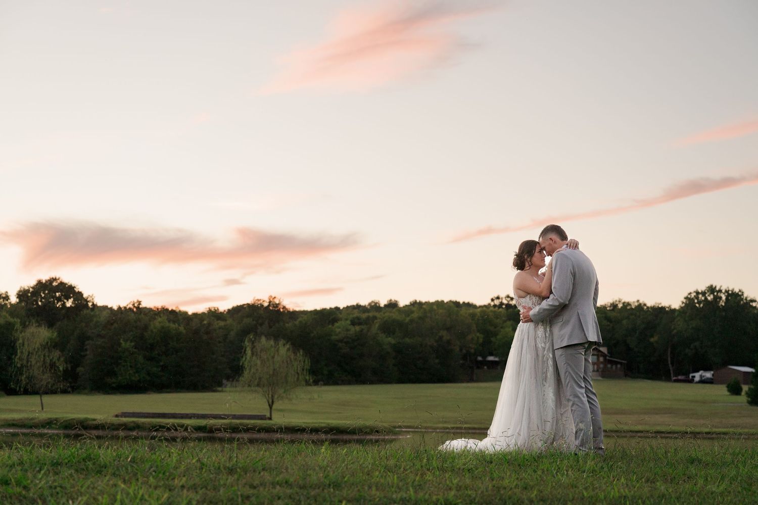 Sunset portrait of bride and groom at Grace Valley Farms in Shelbyville, Tennessee