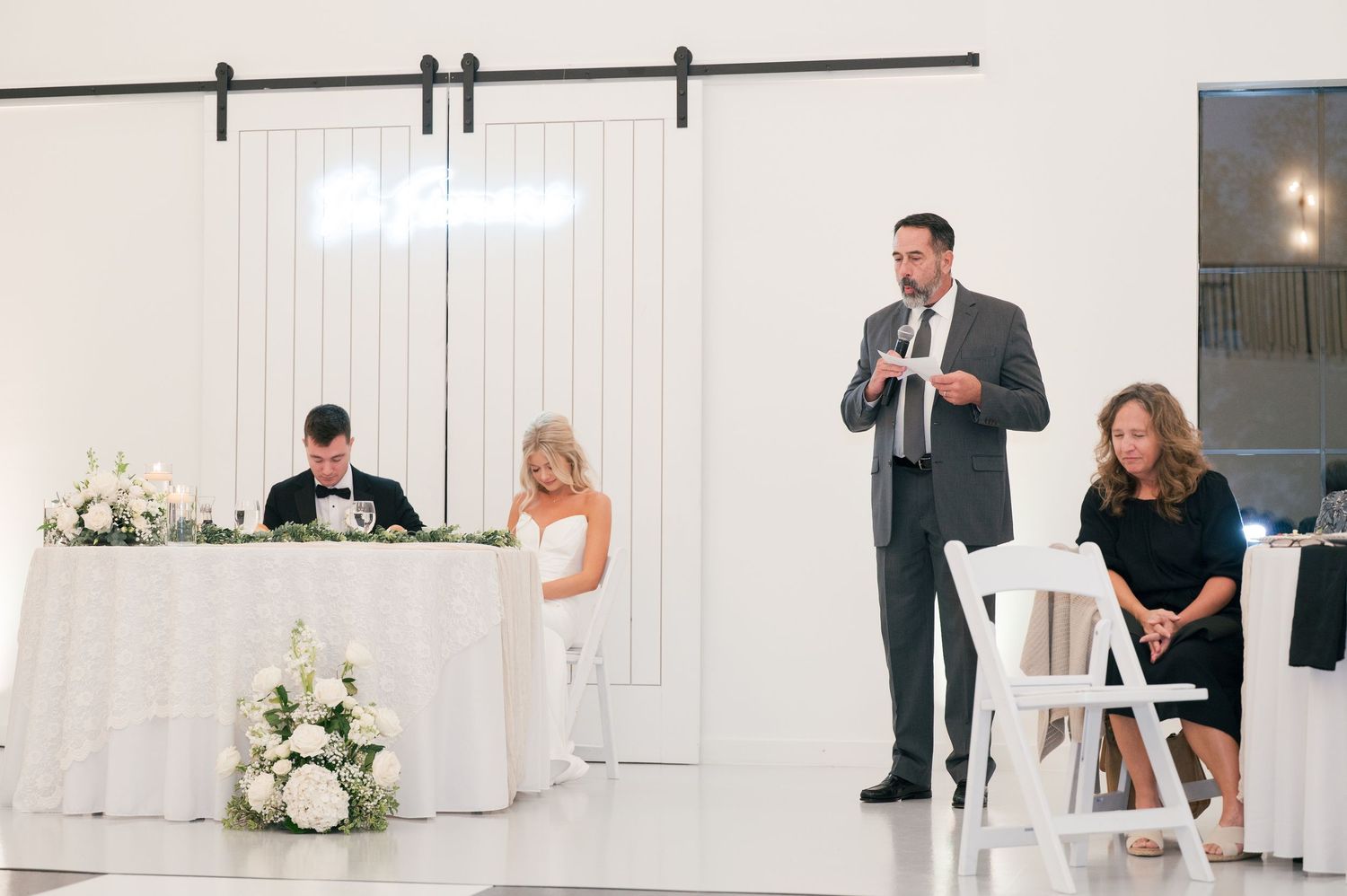 fun wedding reception picture of prayer in McMinnville, Tennessee at The Monroe