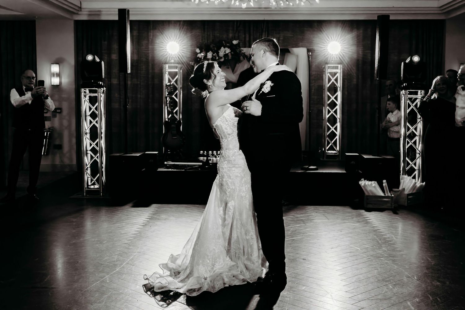 Black and white photo of couple dancing on an elegant ballroom floor during first dance at The Crow Wood Hotel and Spa, Burnley.  Lancashire