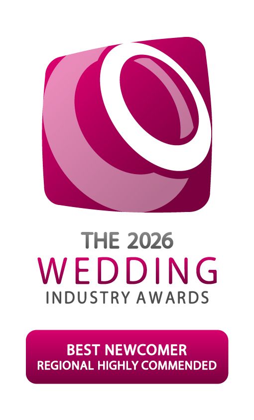 Pink and magenta wedding industry award badge for Best Newcomer Regional Highly Commended.  North West Region 2026.