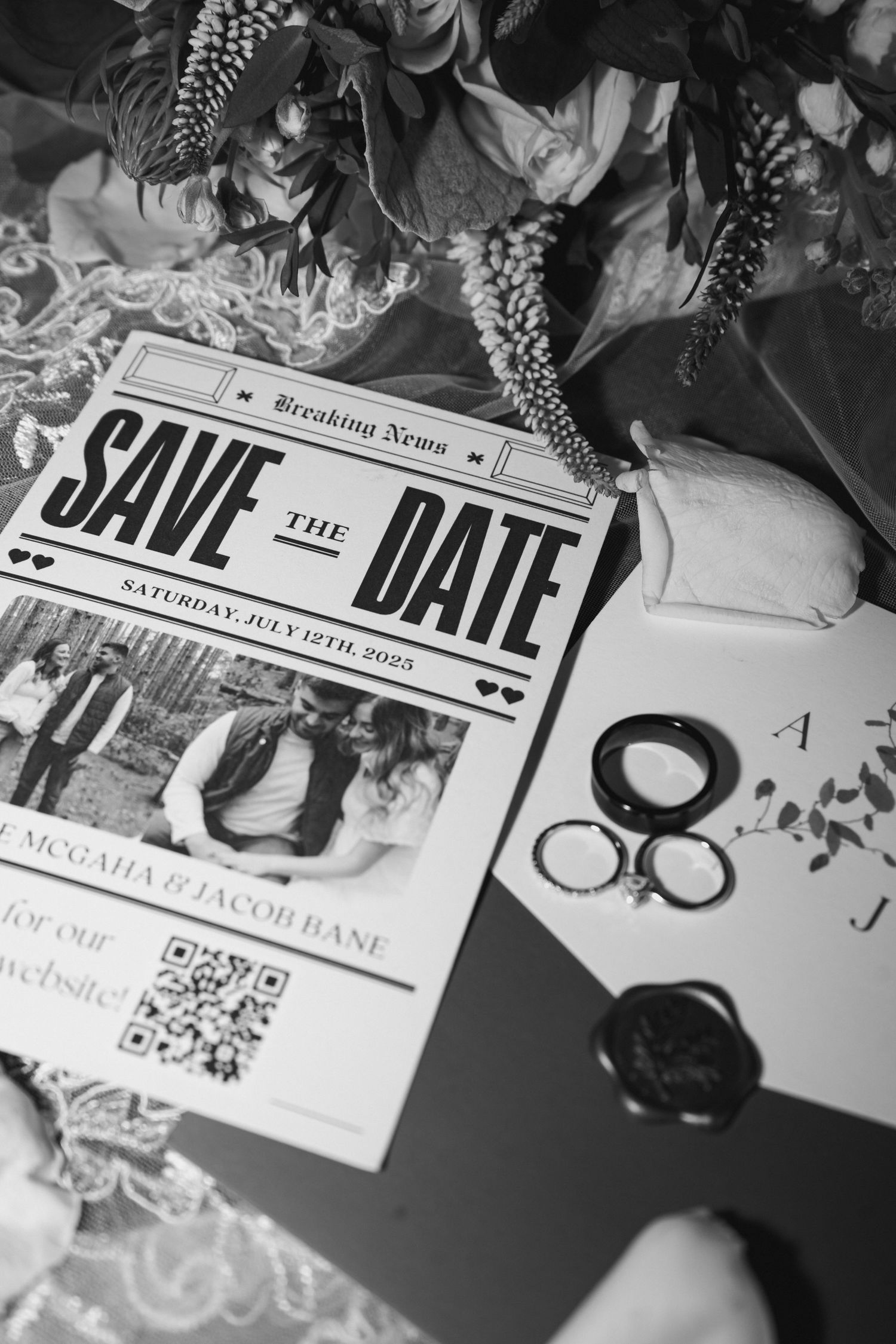 Collection of black and white wedding save the date cards with floral decorations.
