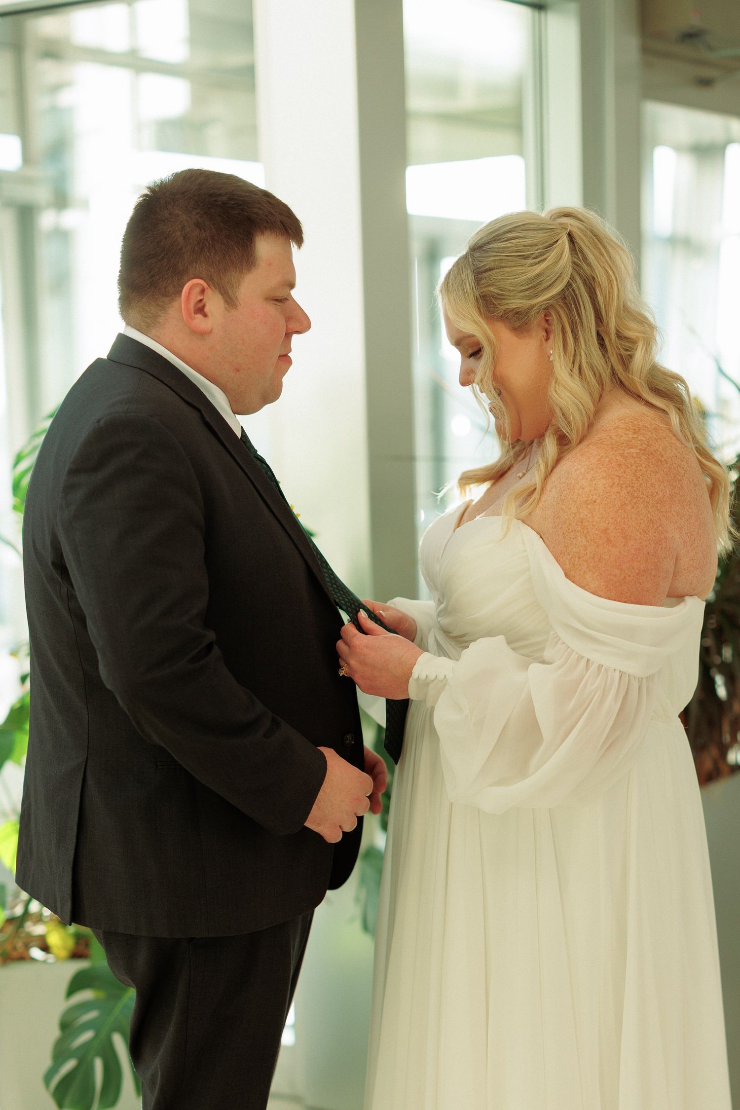 Indoor wedding photography sequence showing couple in intimate moments.