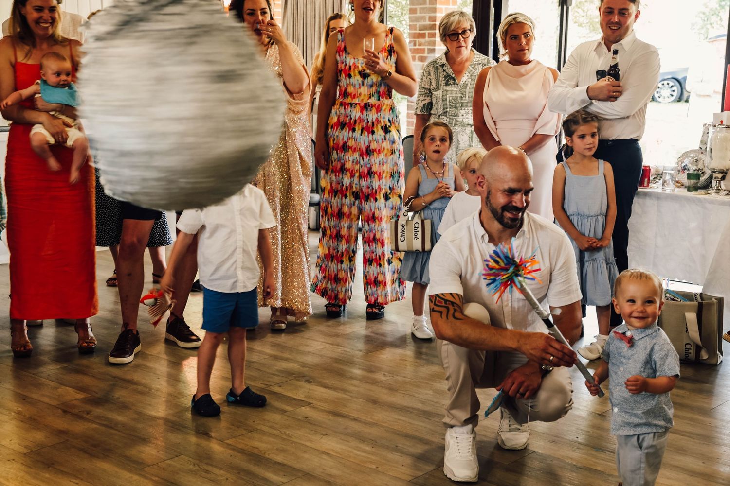 bride and groom at reception in West Sussex, Petworth. relaxed wedding, documentary photography