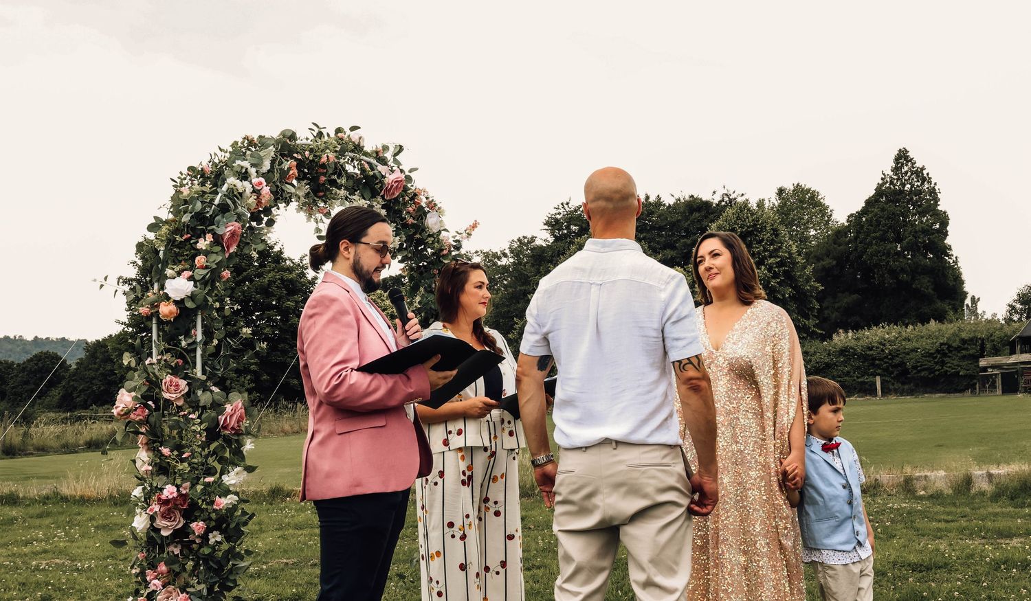 bride and groom at reception in West Sussex, Petworth. relaxed wedding, documentary photography. Dancing, evening reception, fun
