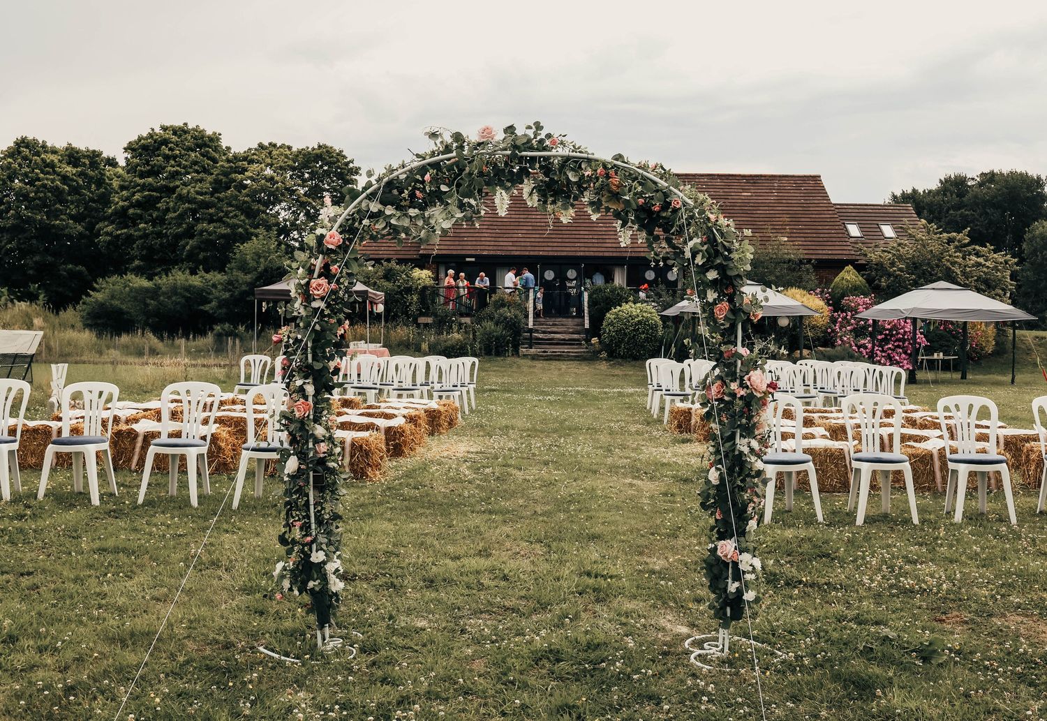 bride and groom at reception in West Sussex, Petworth. relaxed wedding, documentary photography