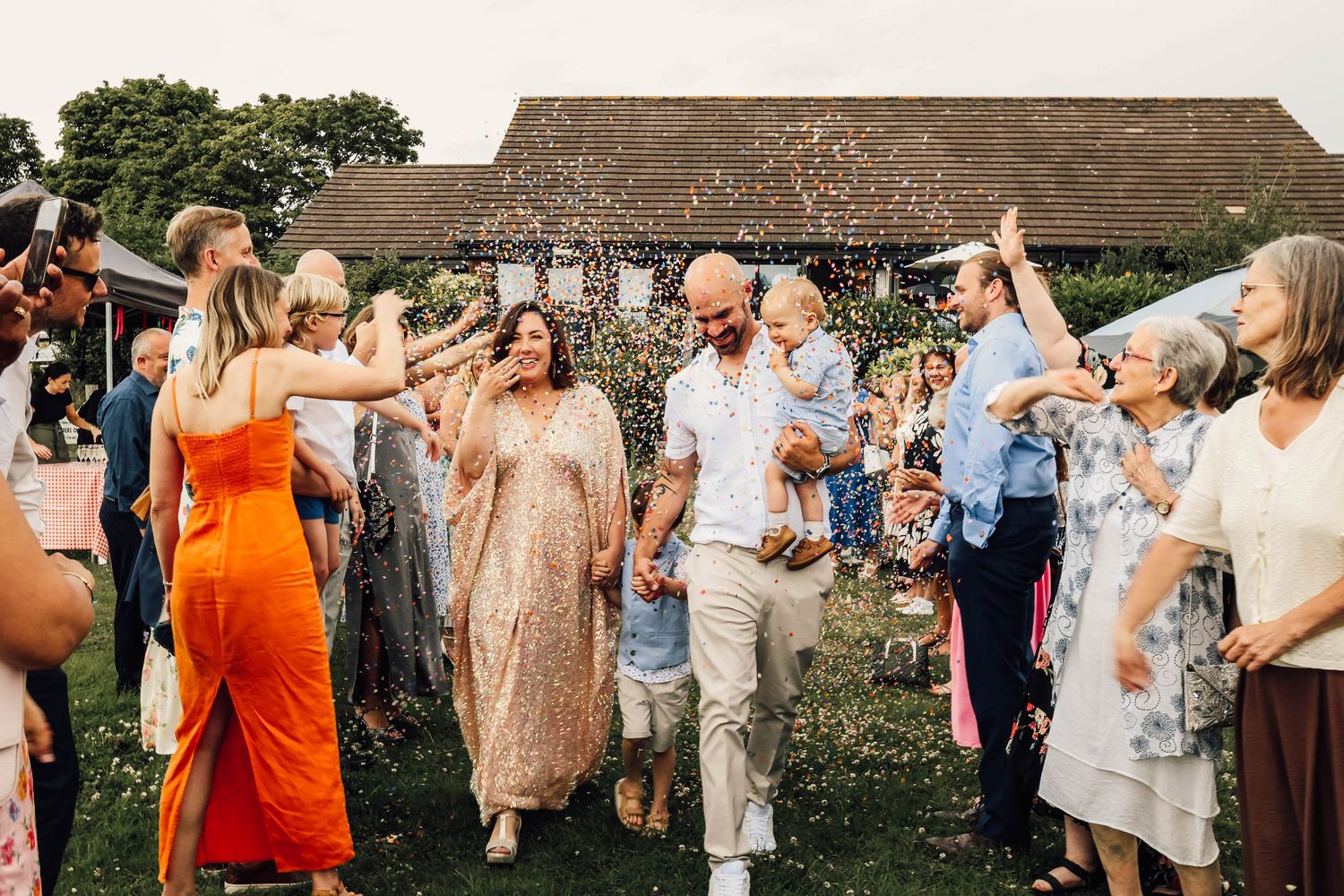bride and groom at reception in West Sussex, Petworth. relaxed wedding, documentary photography