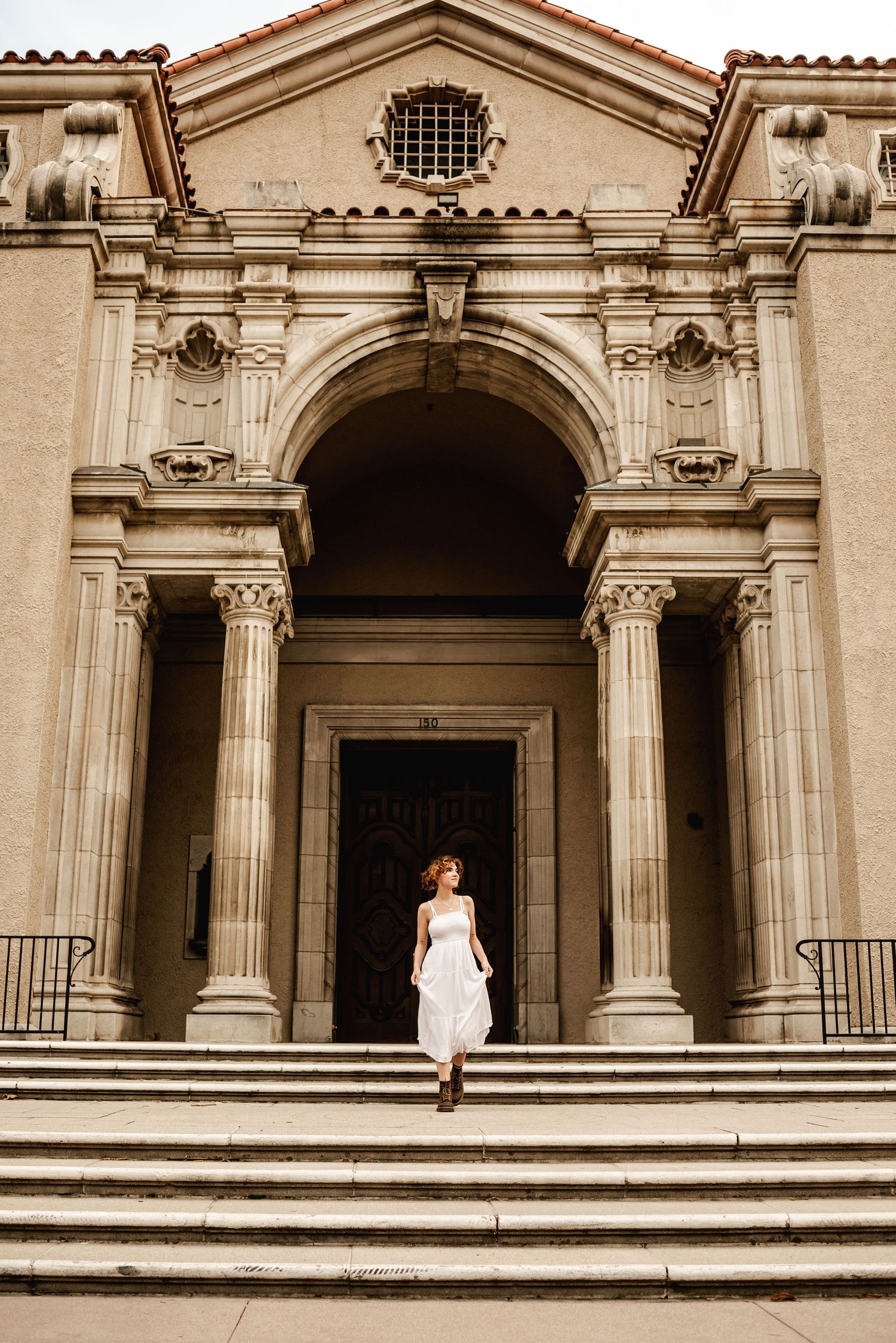 A series of architectural photos showing classical columns and archways in a grand building entrance.