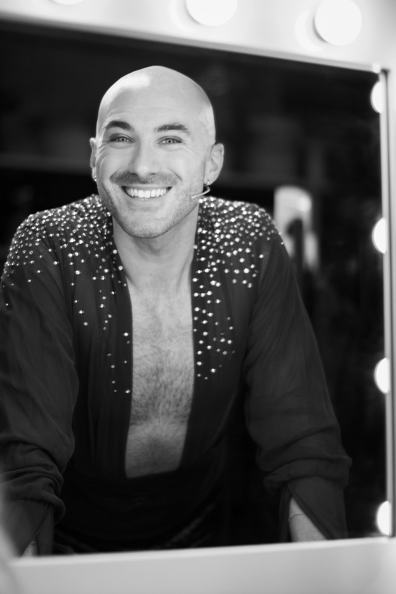 Black and white portrait of Ben Rutter, from the series of 'Swings At The Moulin Rouge!'