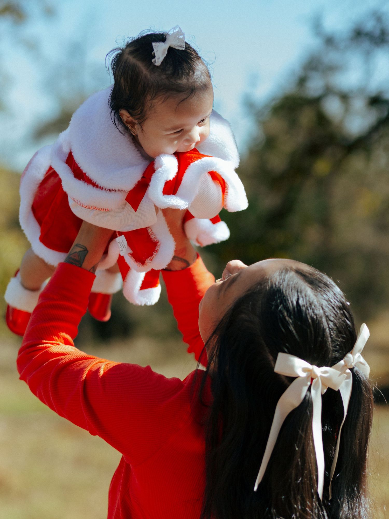 Mother and newborn daughter Christmas session in Austin Texas