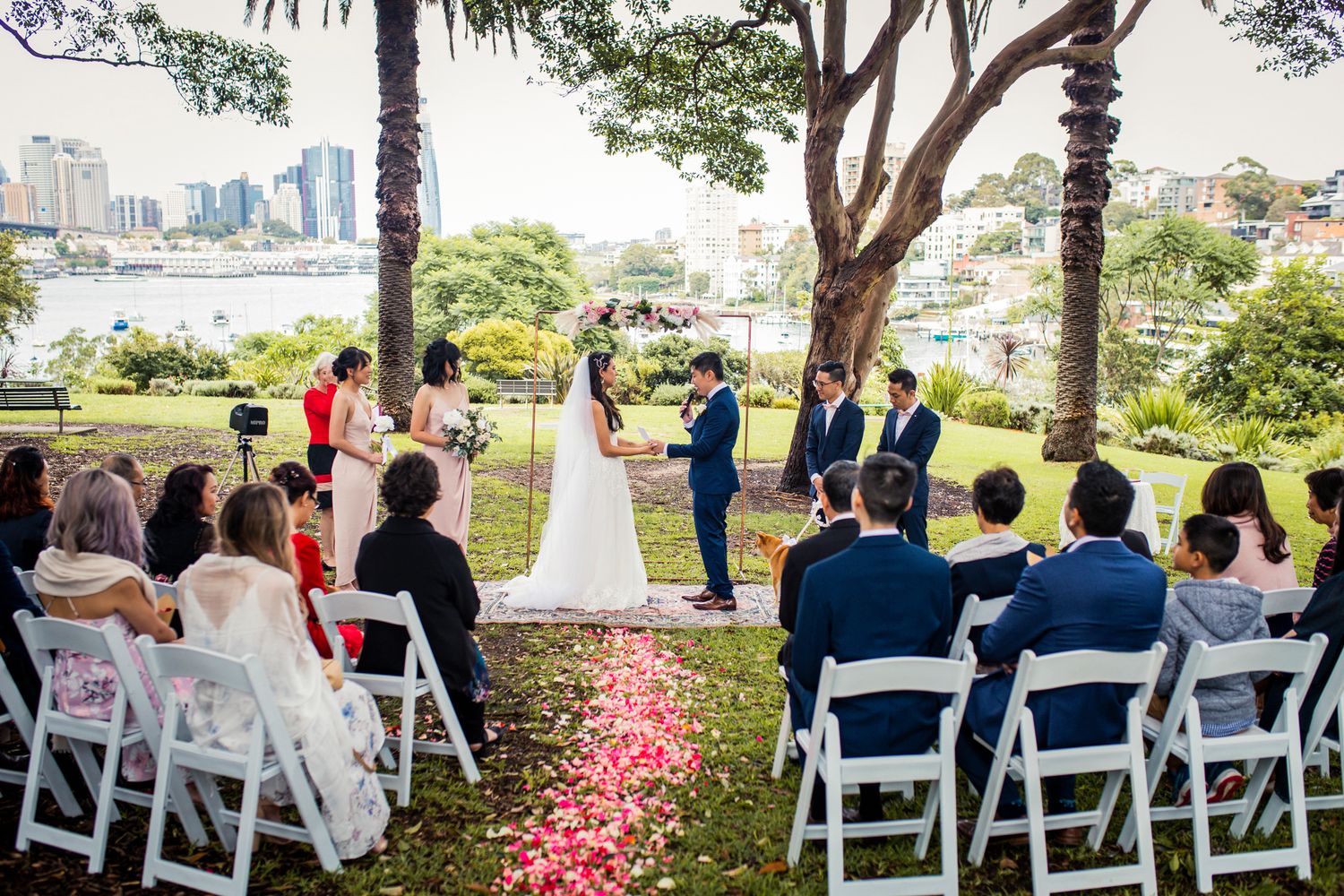 Close up of autumn-toned floral confetti and petals by Elope To Sydney.