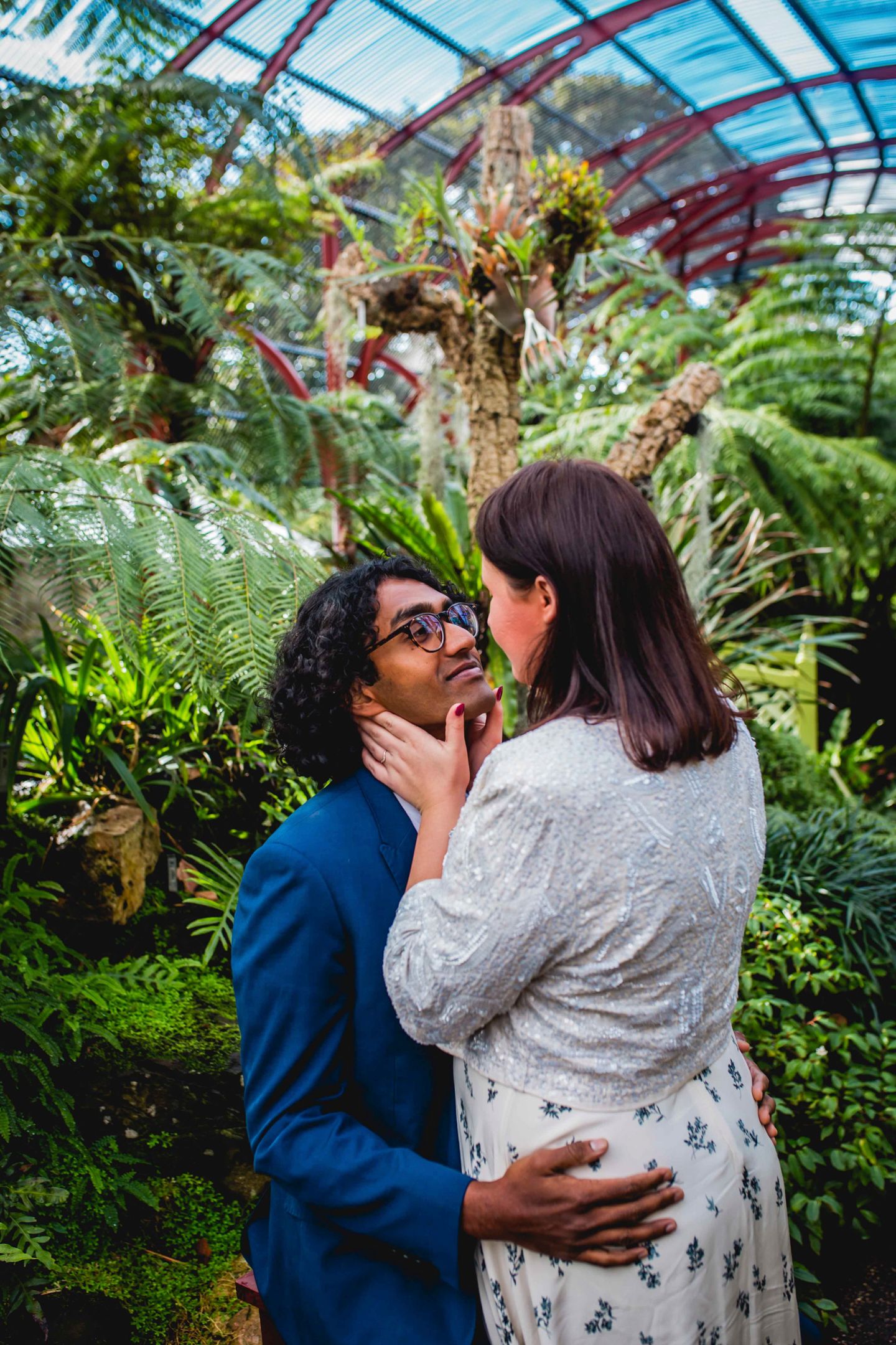 Romantic winter wedding portraits taken among the trees at the Royal Botanic Garden Sydney.