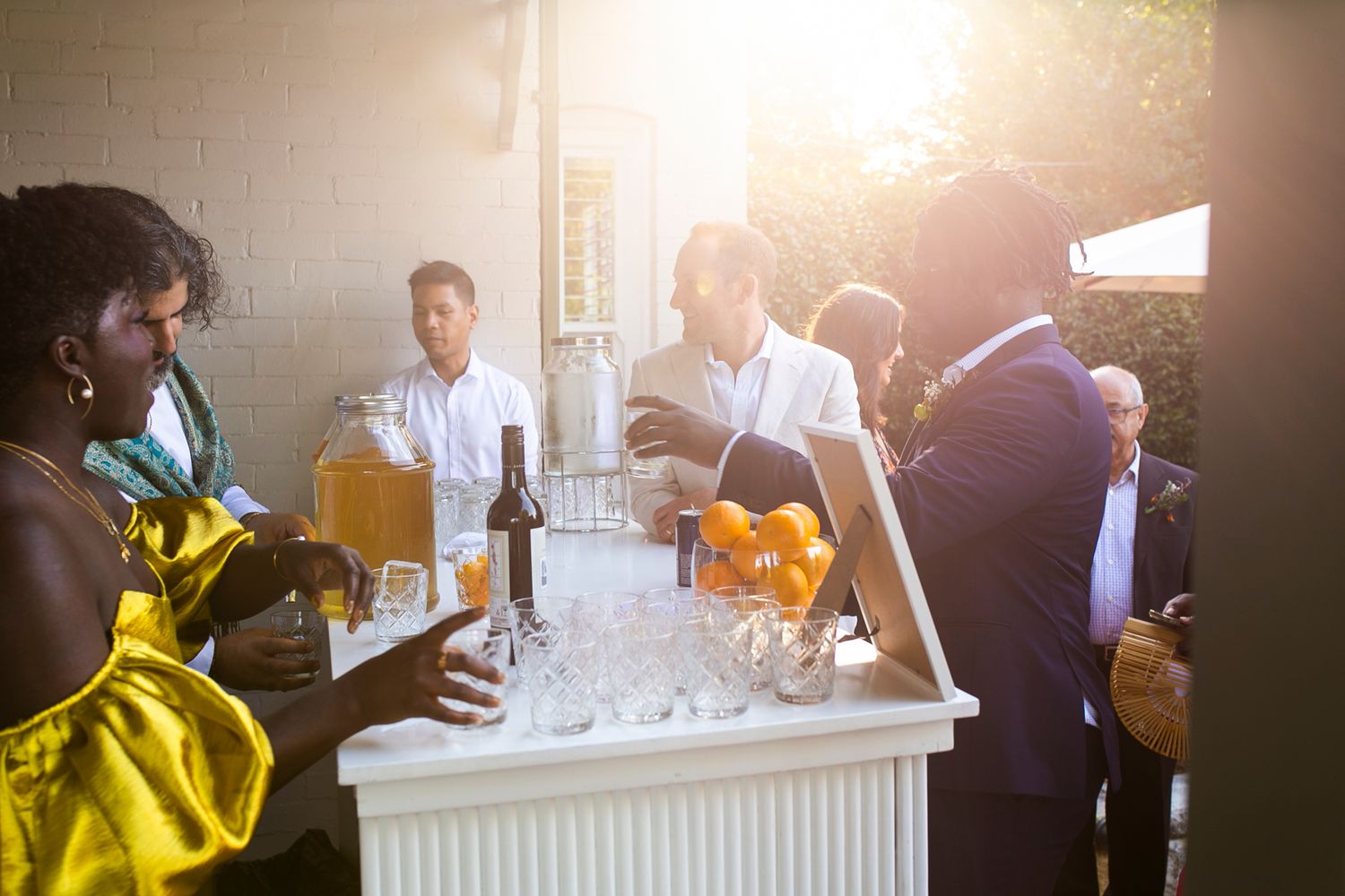 Bespoke cocktails being served to guests at an elegant private estate reception.
