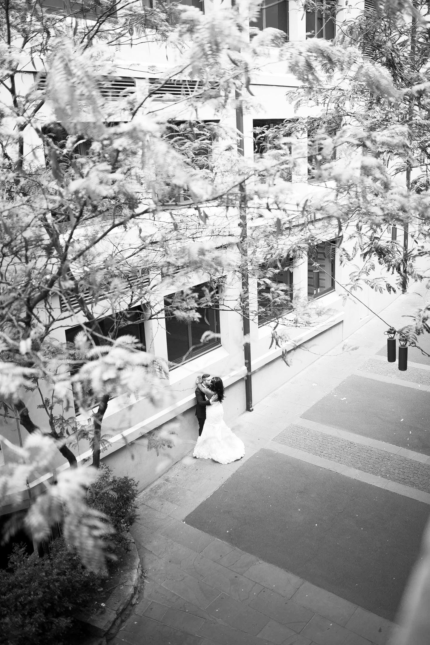 High-fashion editorial portrait of the couple at The Rocks by Koco Weddings.