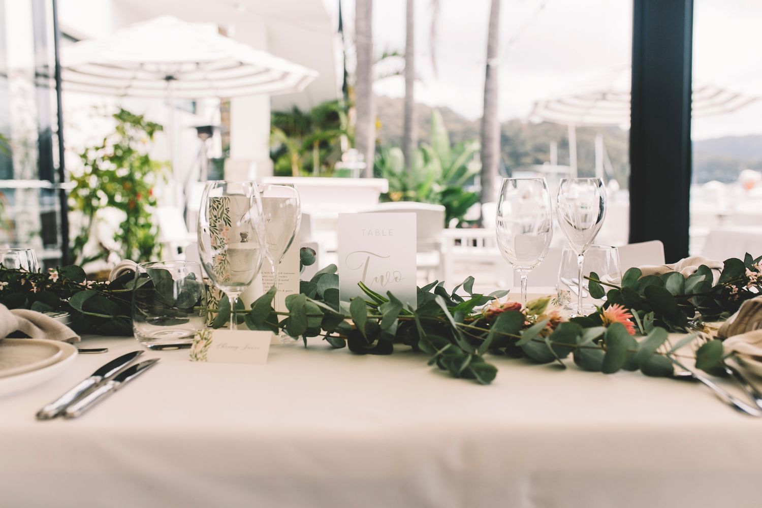 A lavish wedding table set up in/outdoors at Pasadena Sydney.