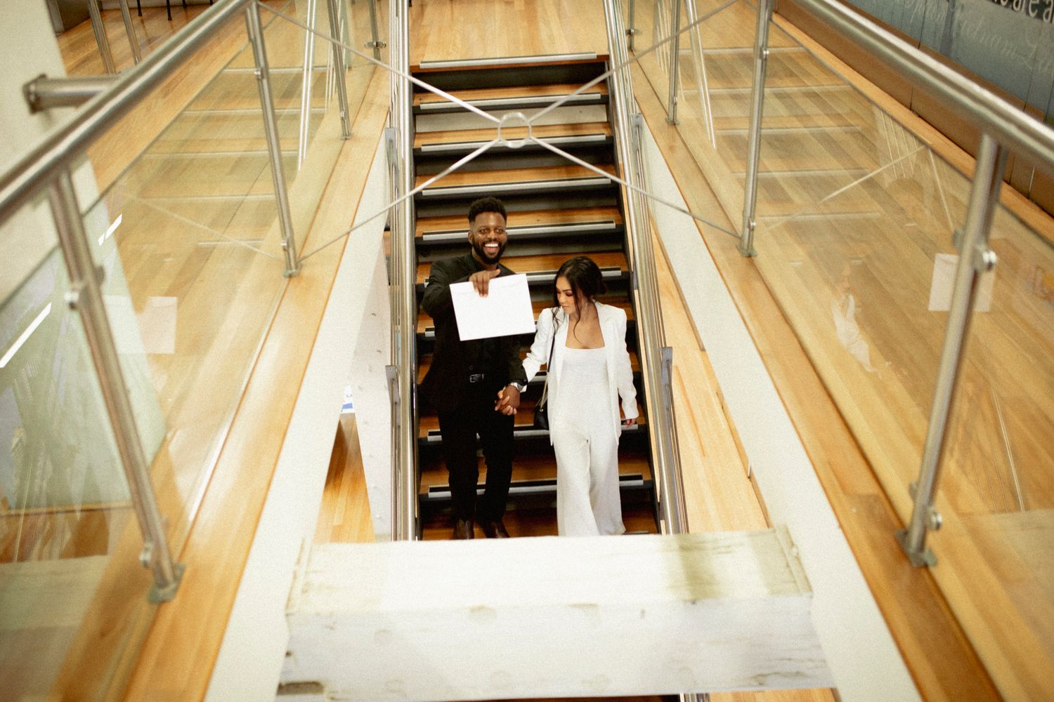 Minimalist chic city elopement portrait featuring urban architecture.