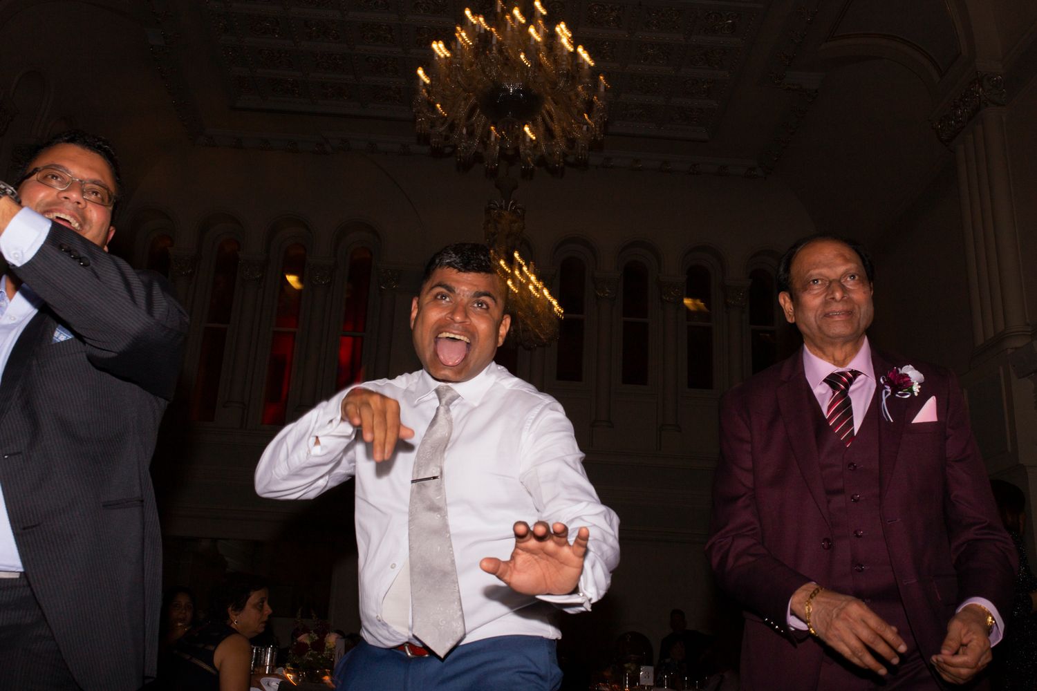 Joyful cultural dancing during the reception at The Tea Room QVB captured by Koco Weddings.
