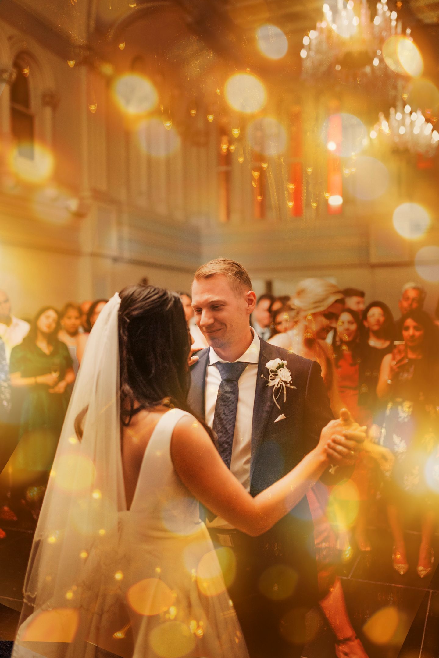 Cinematic portrait of the couple at the iconic room of the Queen Victoria Building.