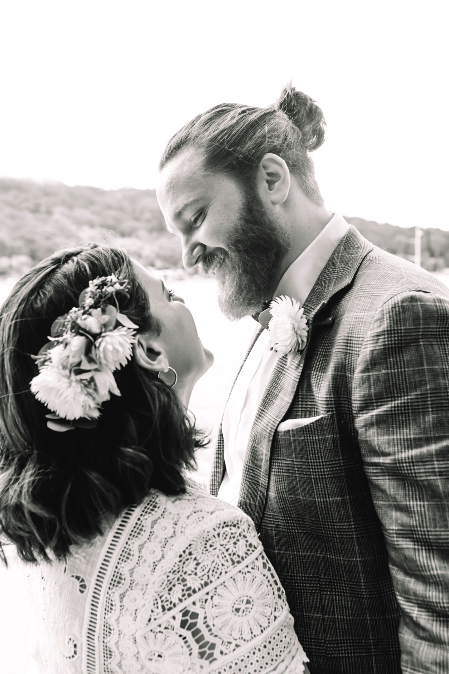 Golden hour portrait of the couple by the water at Church Point by Koco Weddings.