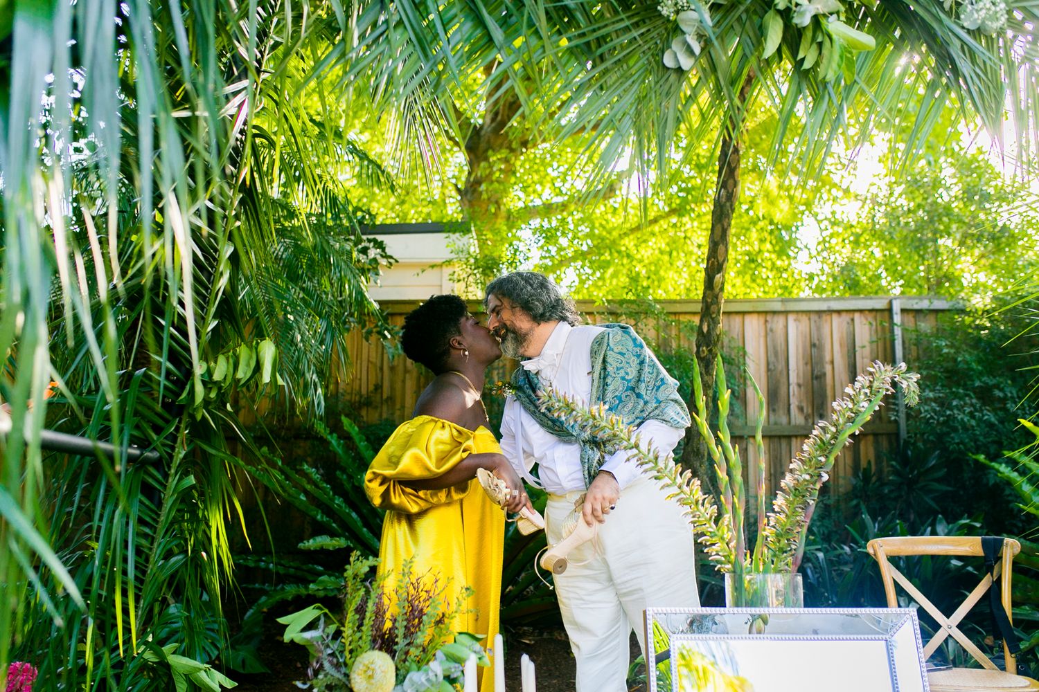 Joyful moment during the traditional Persian Aroosi ceremony captured by Koco Weddings