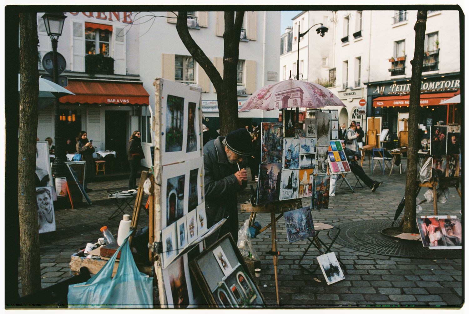 A collection of vintage film street photography scenes showing urban life and architecture in muted tones.