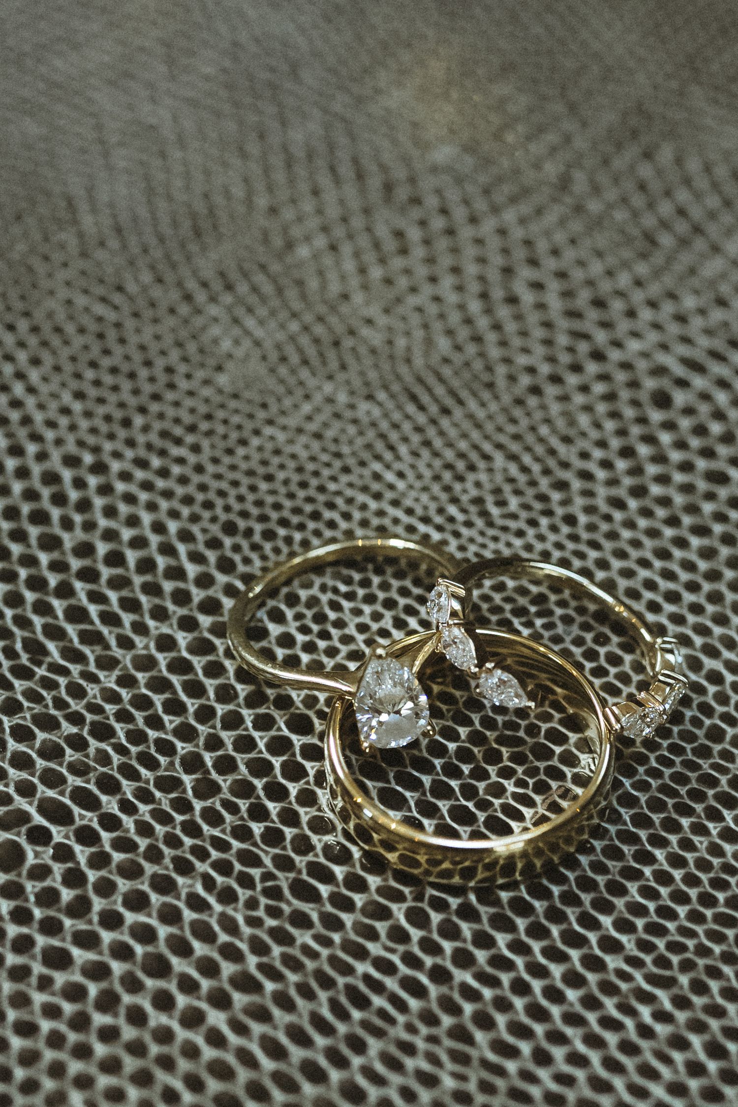 Wedding rings stacked together during bridal prep on wedding day