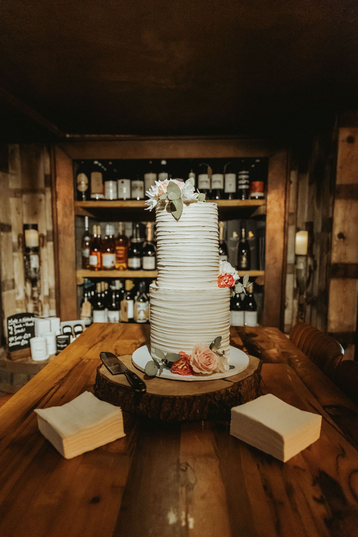 Two tiered wedding cake with floral decoration